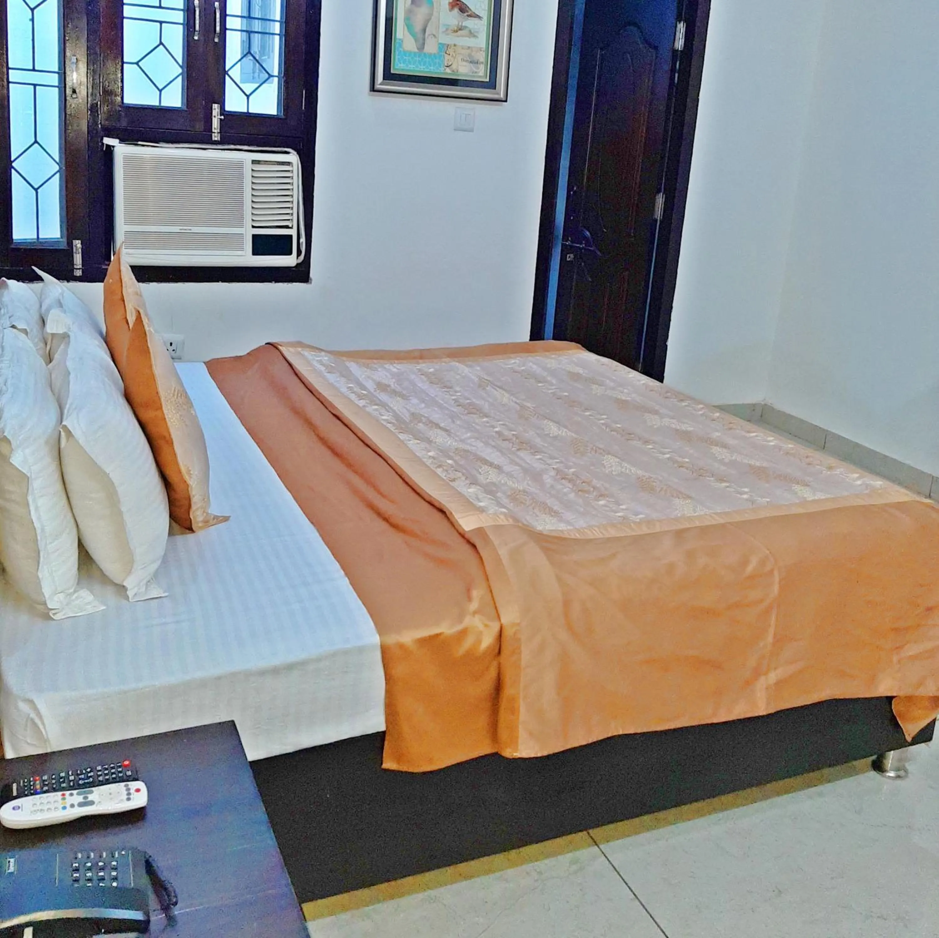 Bed in Bindiram Express by ShriGo Hotels