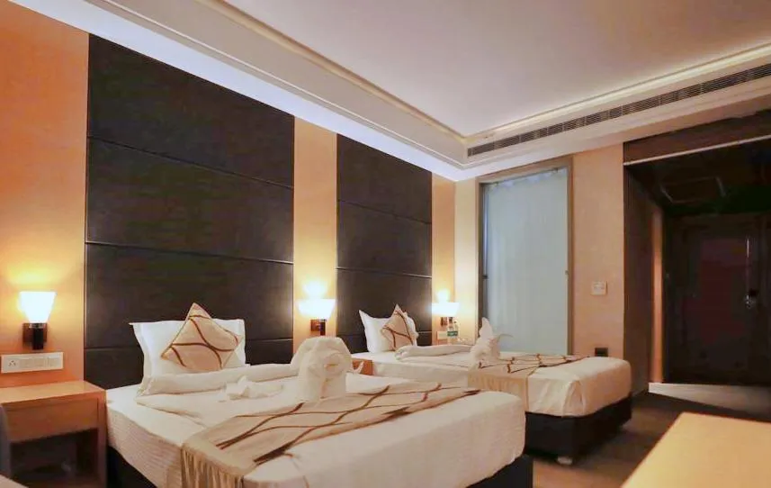 Bed in Bindiram Express by ShriGo Hotels