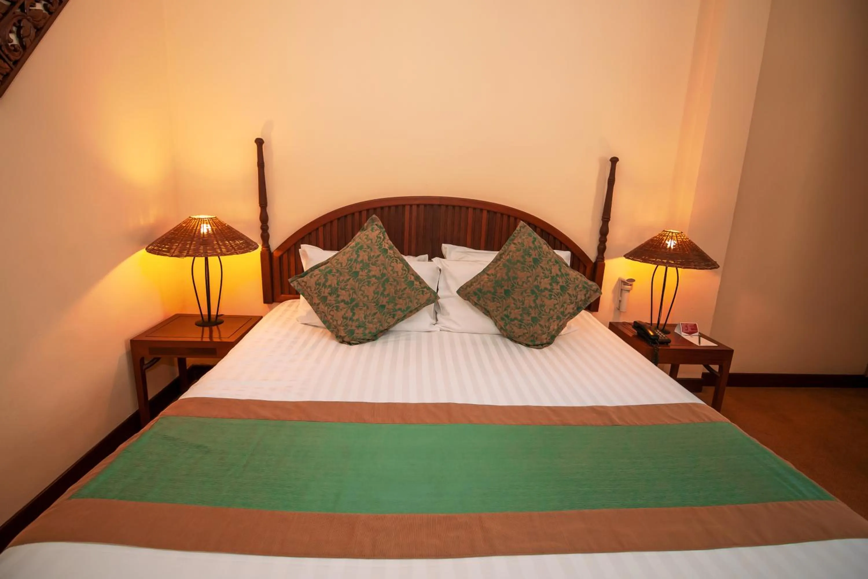 Bed in LAOTEL VIENTIANE