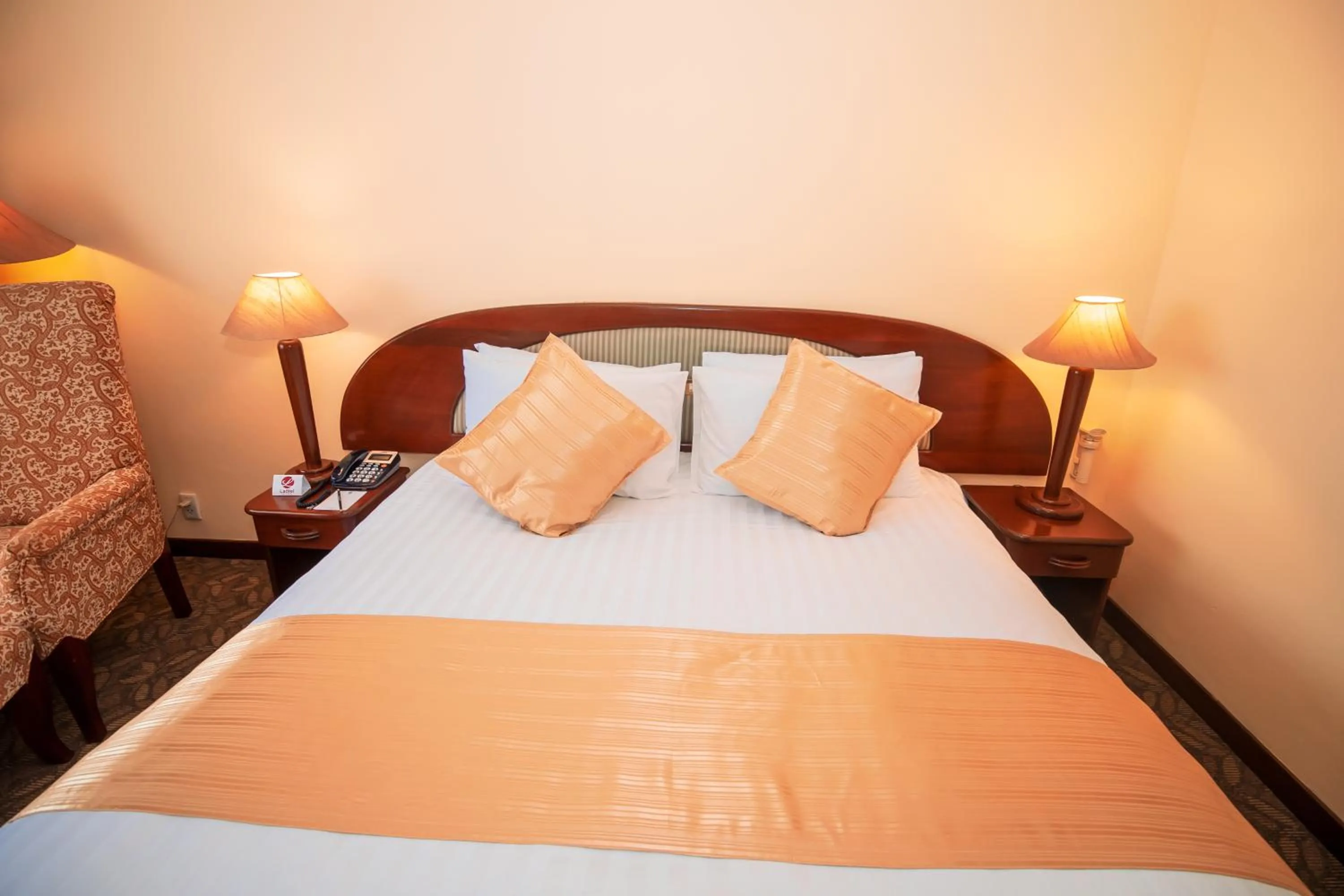 Bed in LAOTEL VIENTIANE