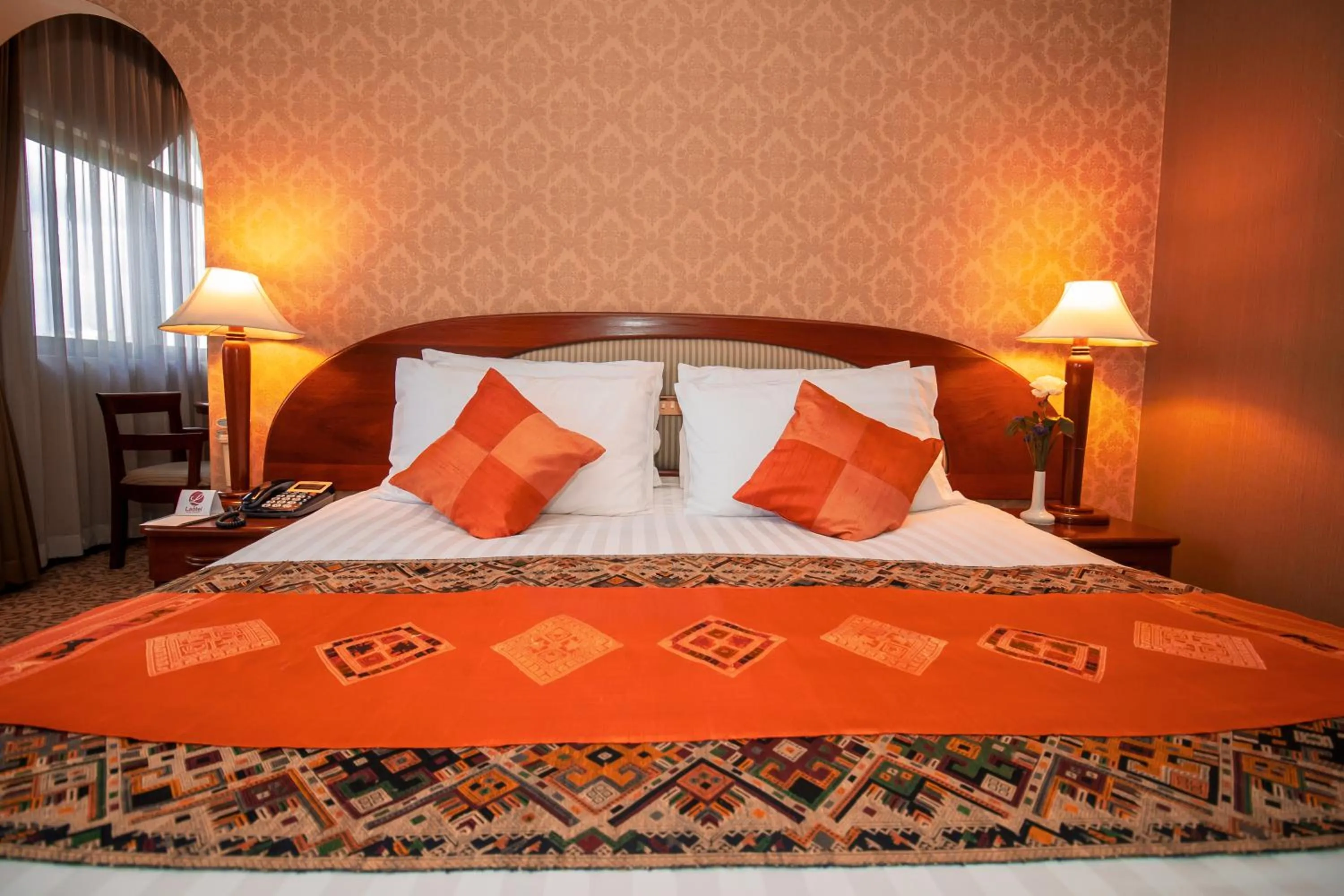 Bed in LAOTEL VIENTIANE