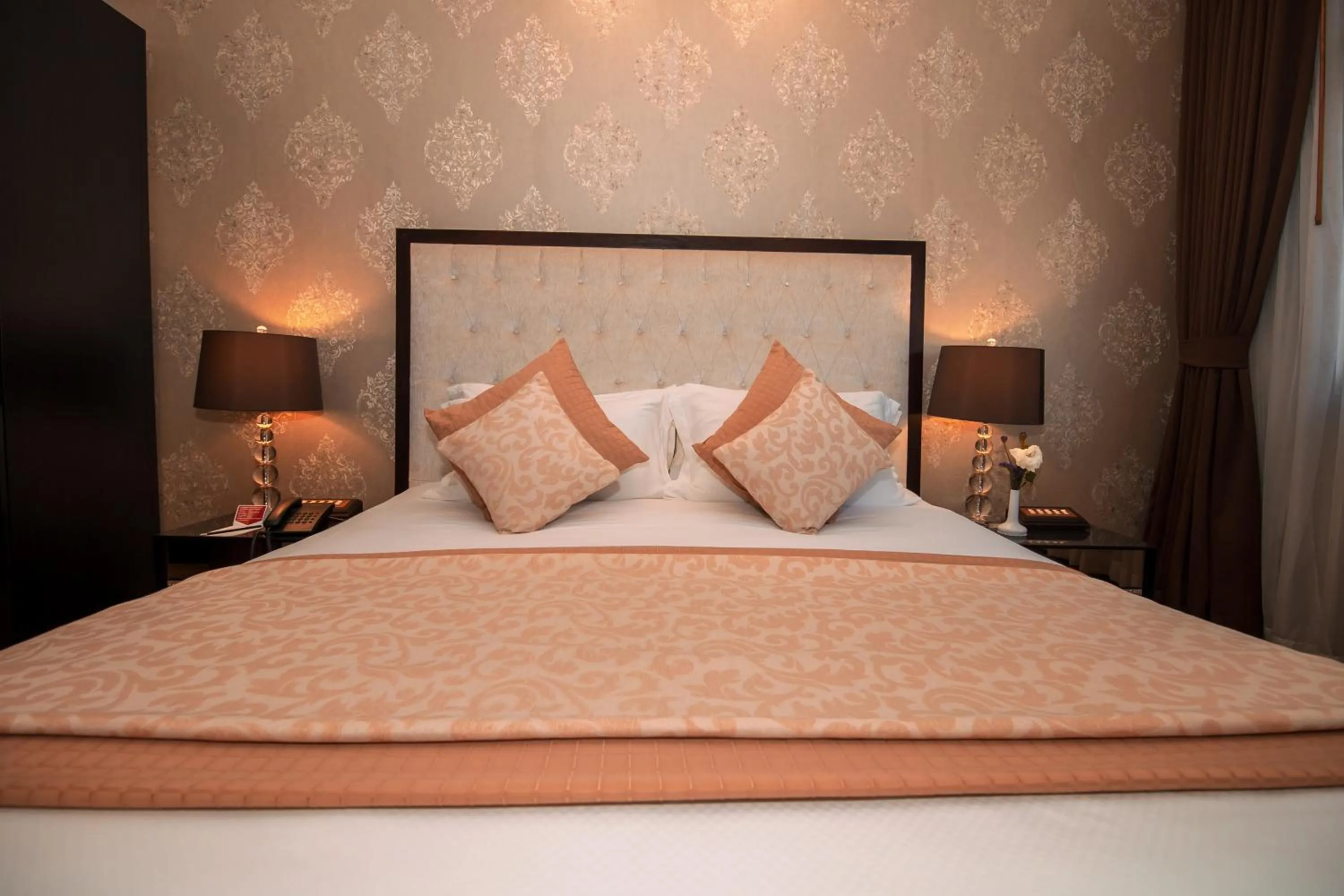 Bed in LAOTEL VIENTIANE