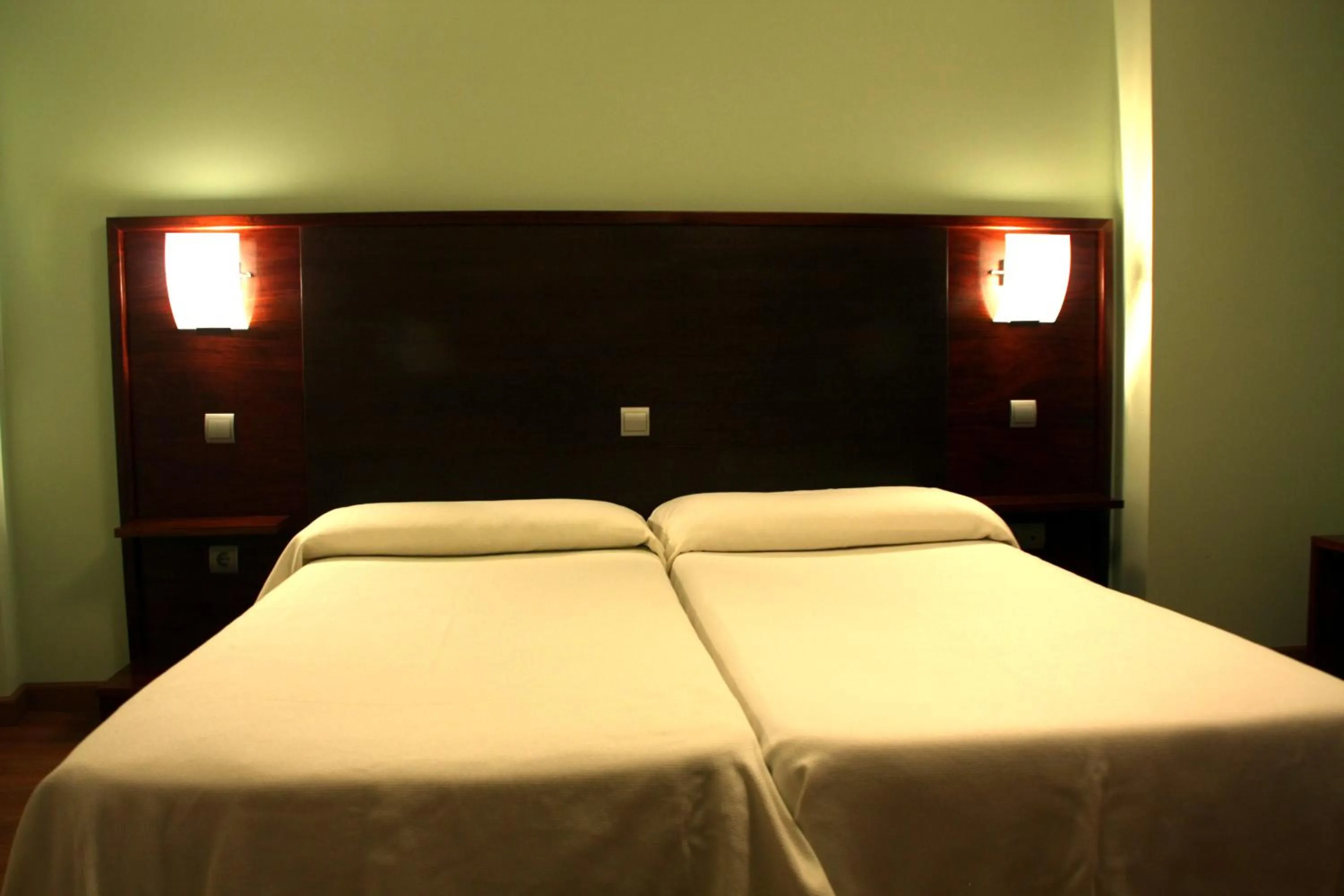 Bed in Hotel Tremazal