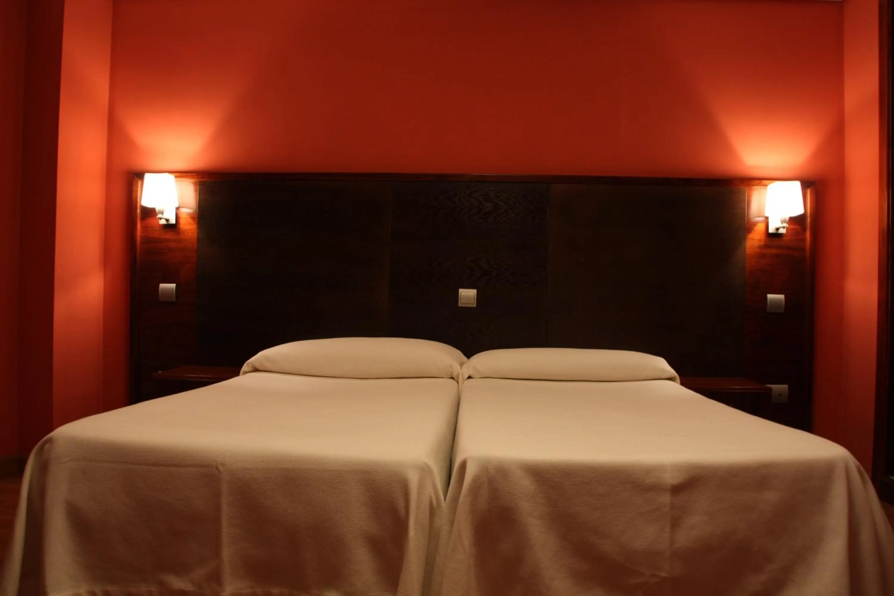 Bed in Hotel Tremazal