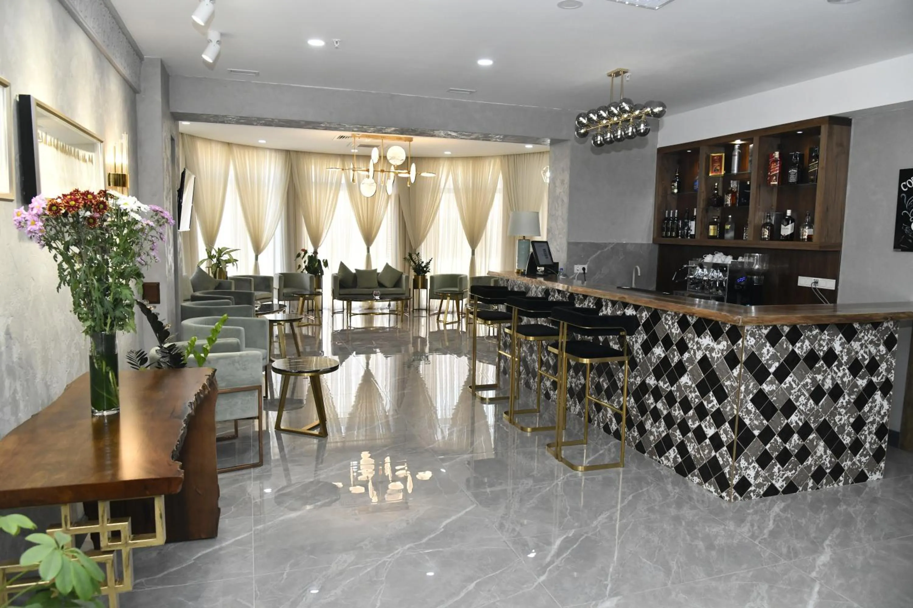 Lounge or bar in Krokus Plaza