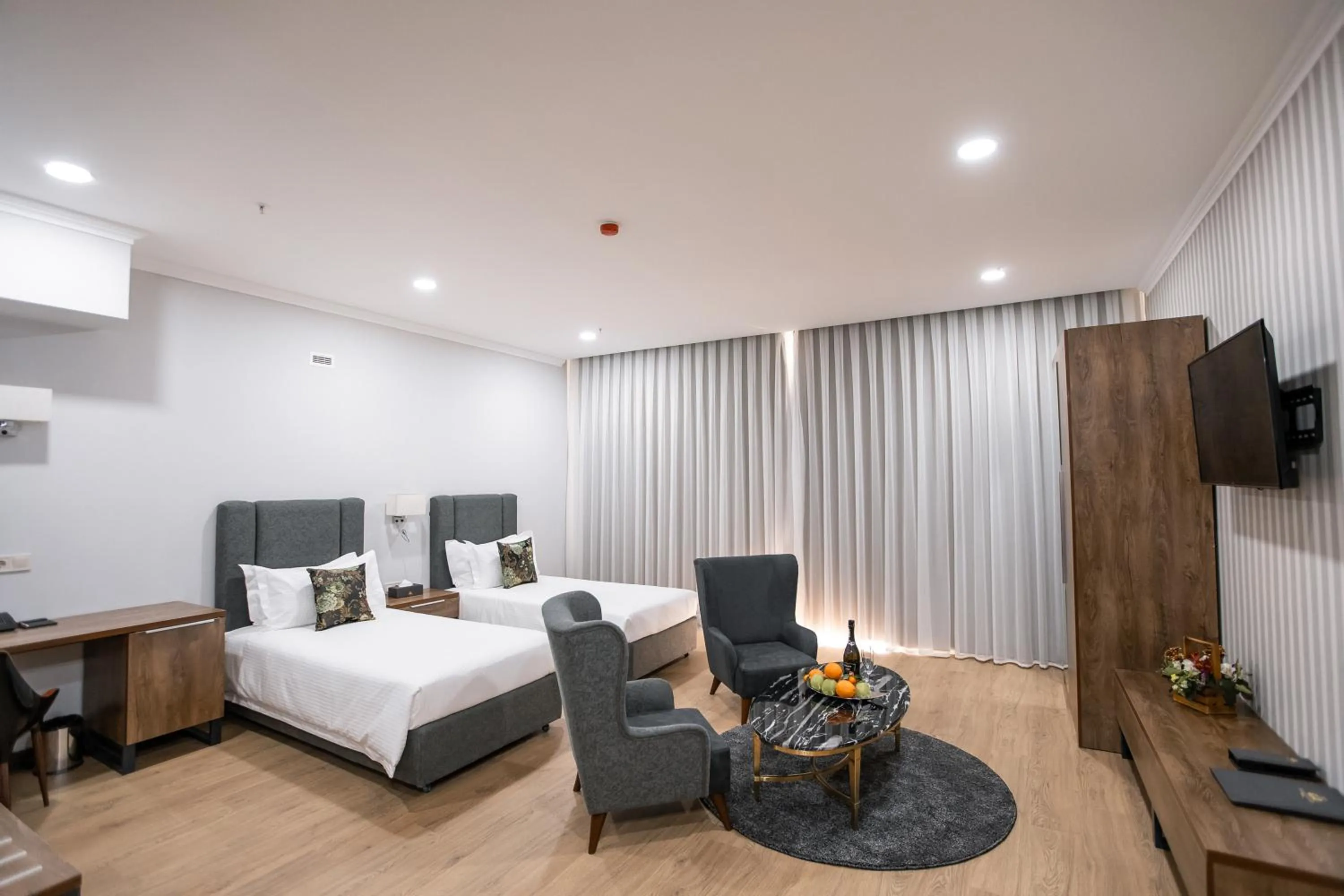 Living room, Bed in Krokus Plaza