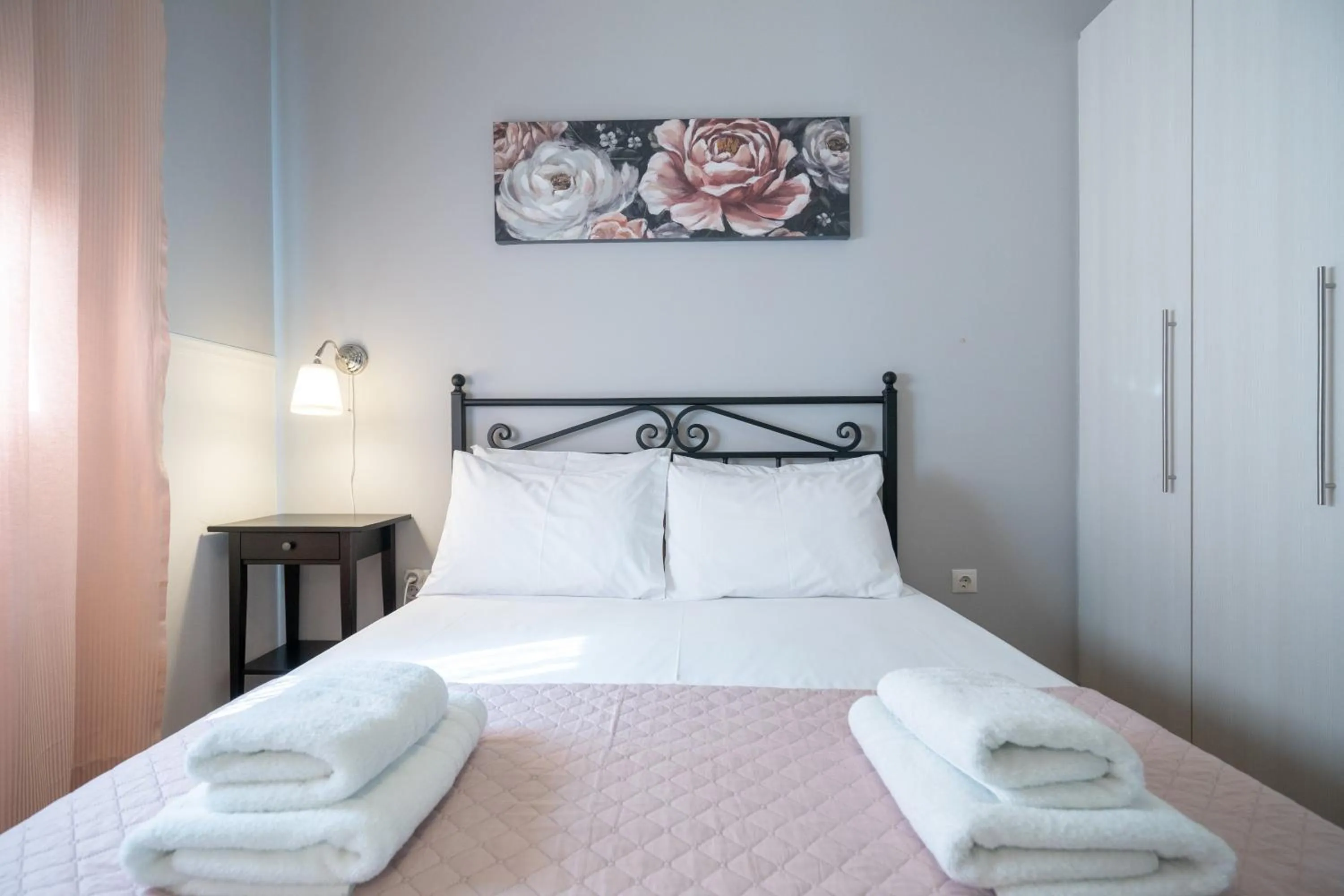 Bed in Olympia's Apartments by Traser