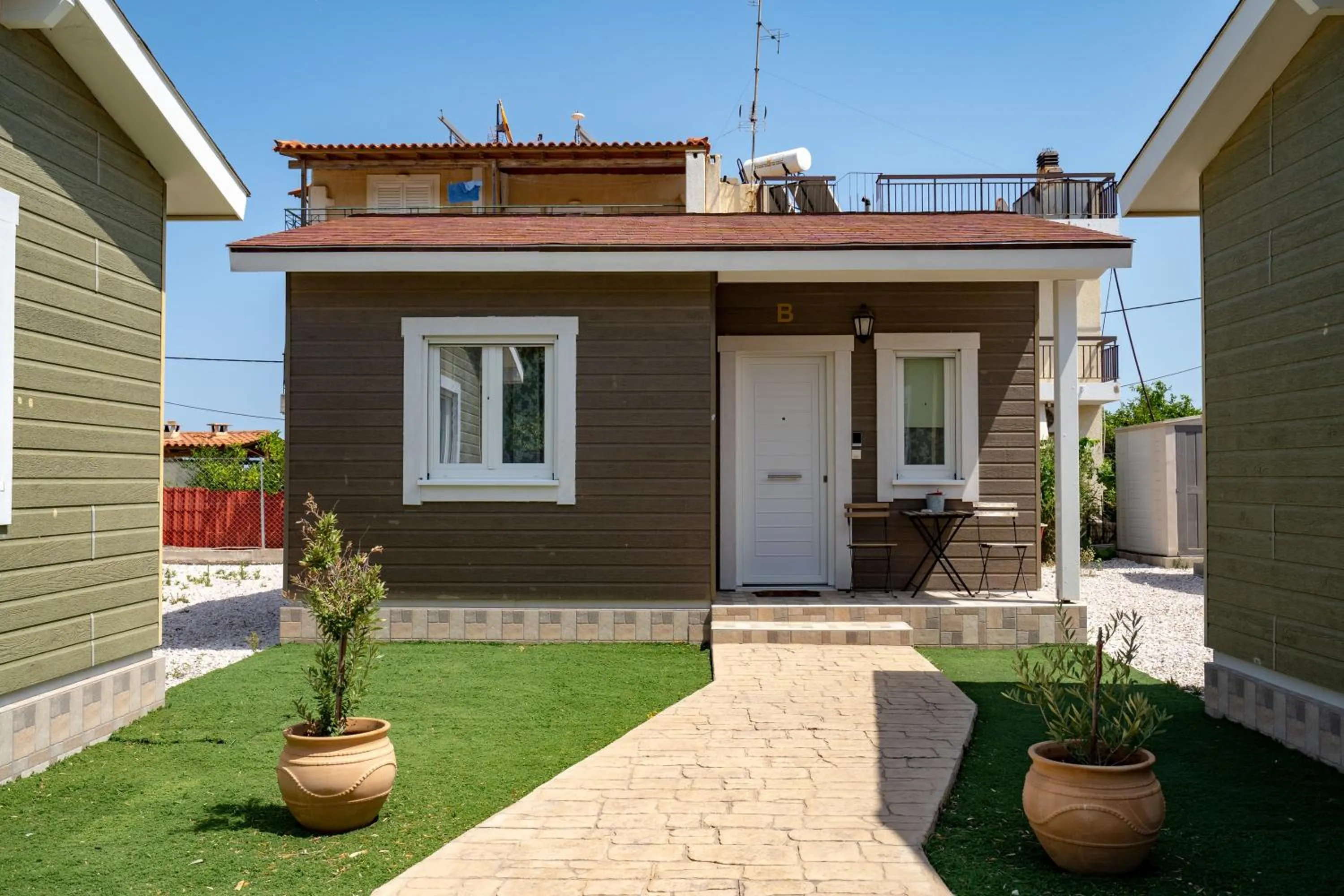 Property building in Olympia's Apartments by Traser