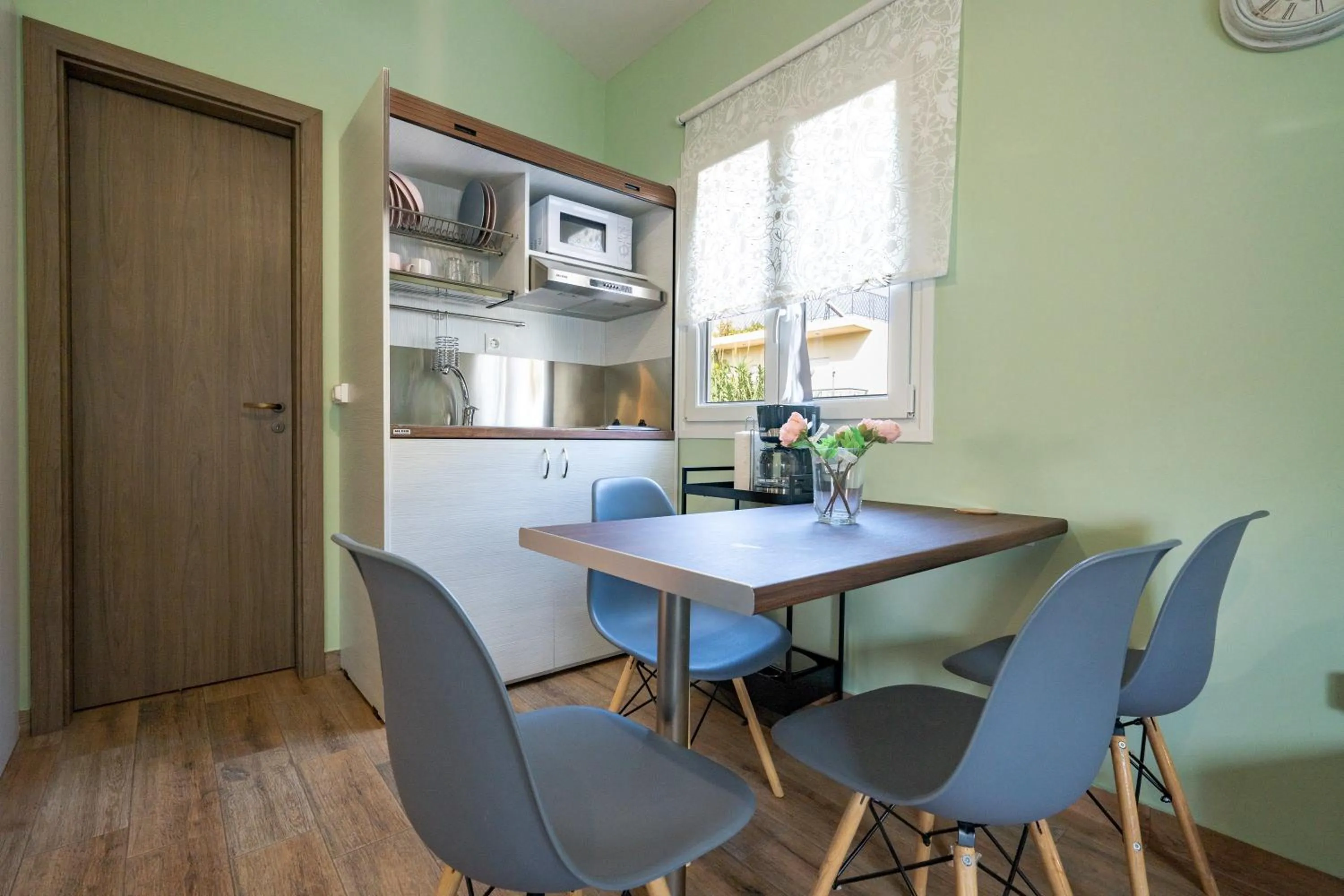 Kitchen or kitchenette in Olympia's Apartments by Traser