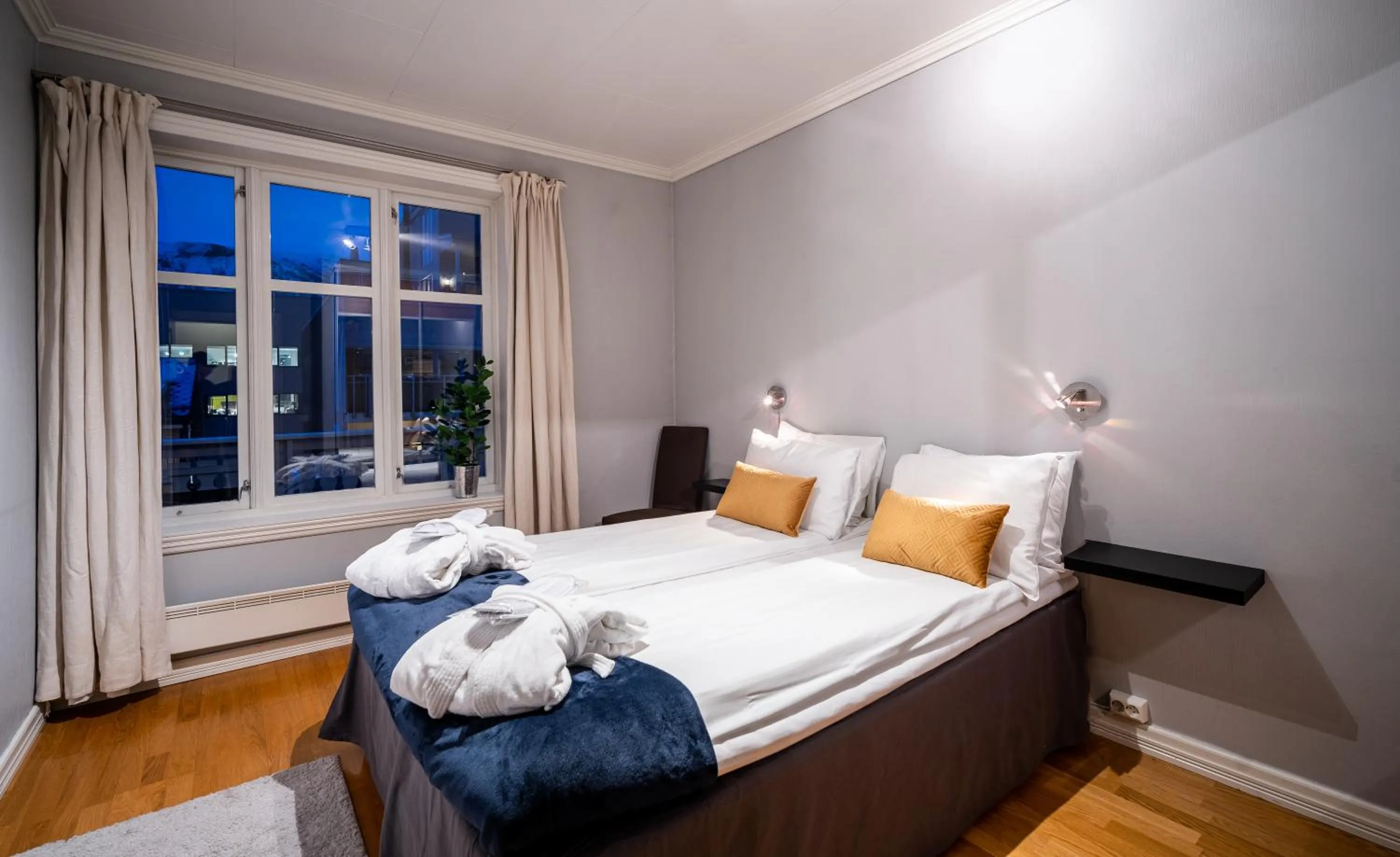 Bedroom, Bed in Enter Tromsø - Exclusive Apartments