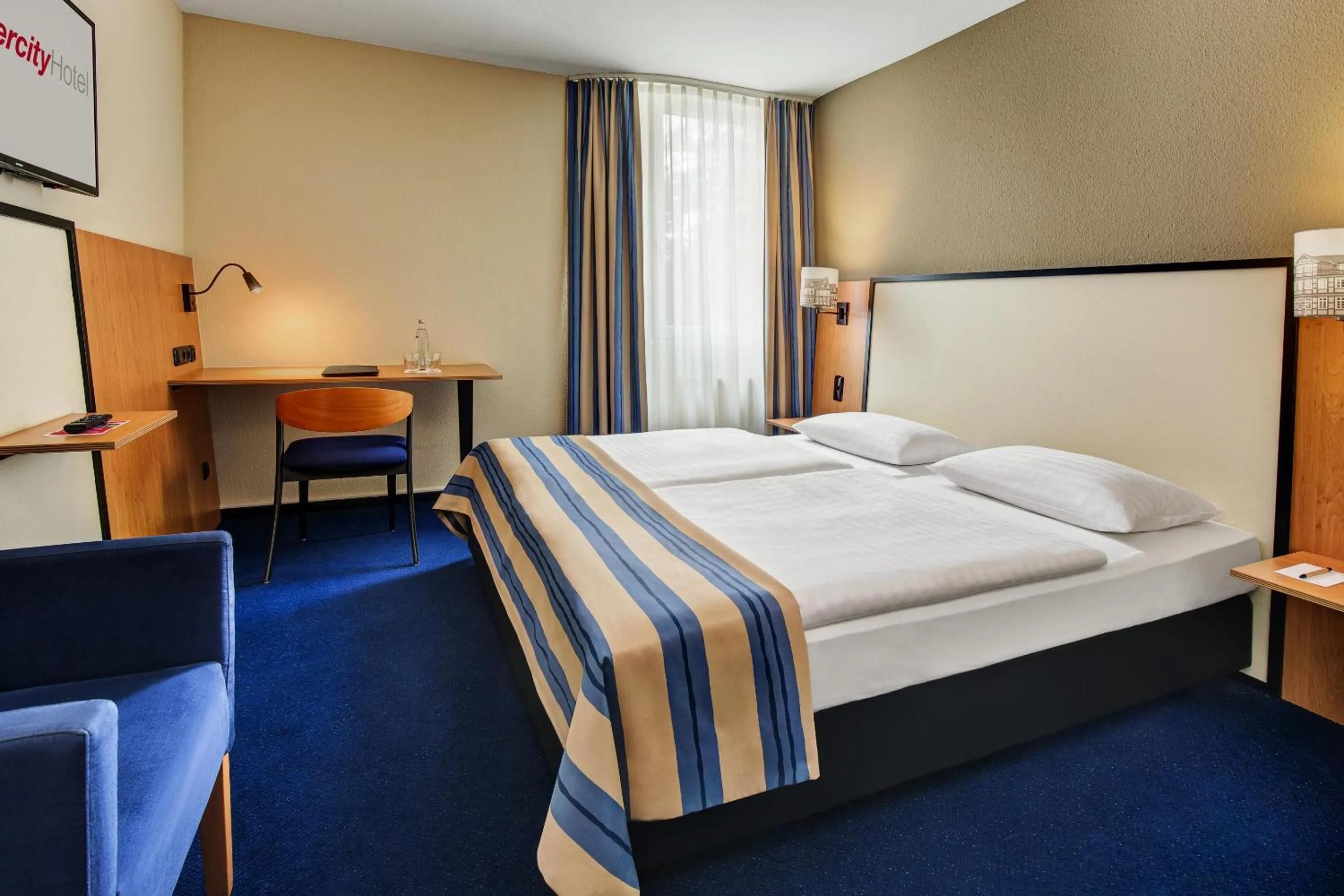 Photo of the whole room, Bed in IntercityHotel Celle