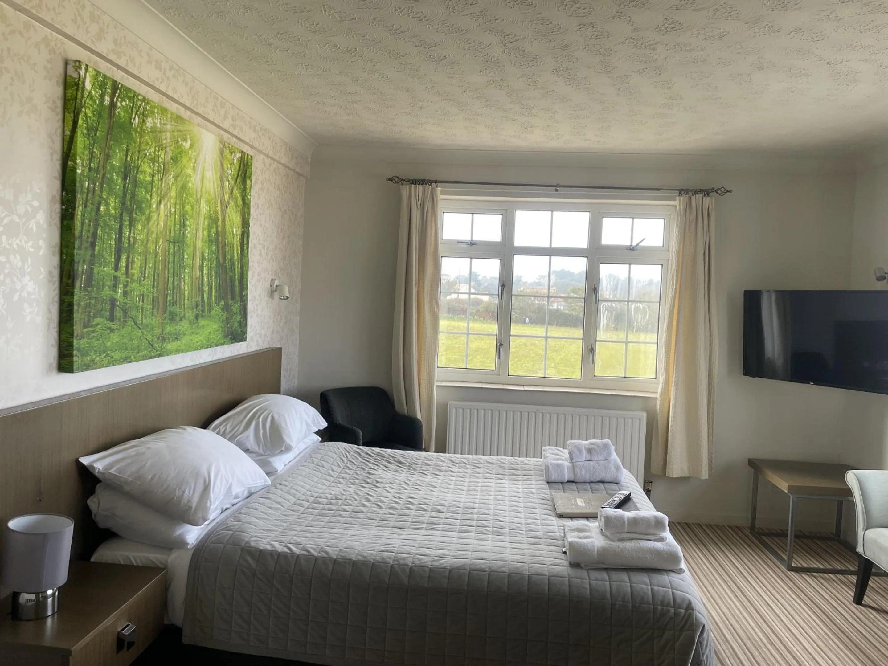 Bed in The Dormy House Hotel