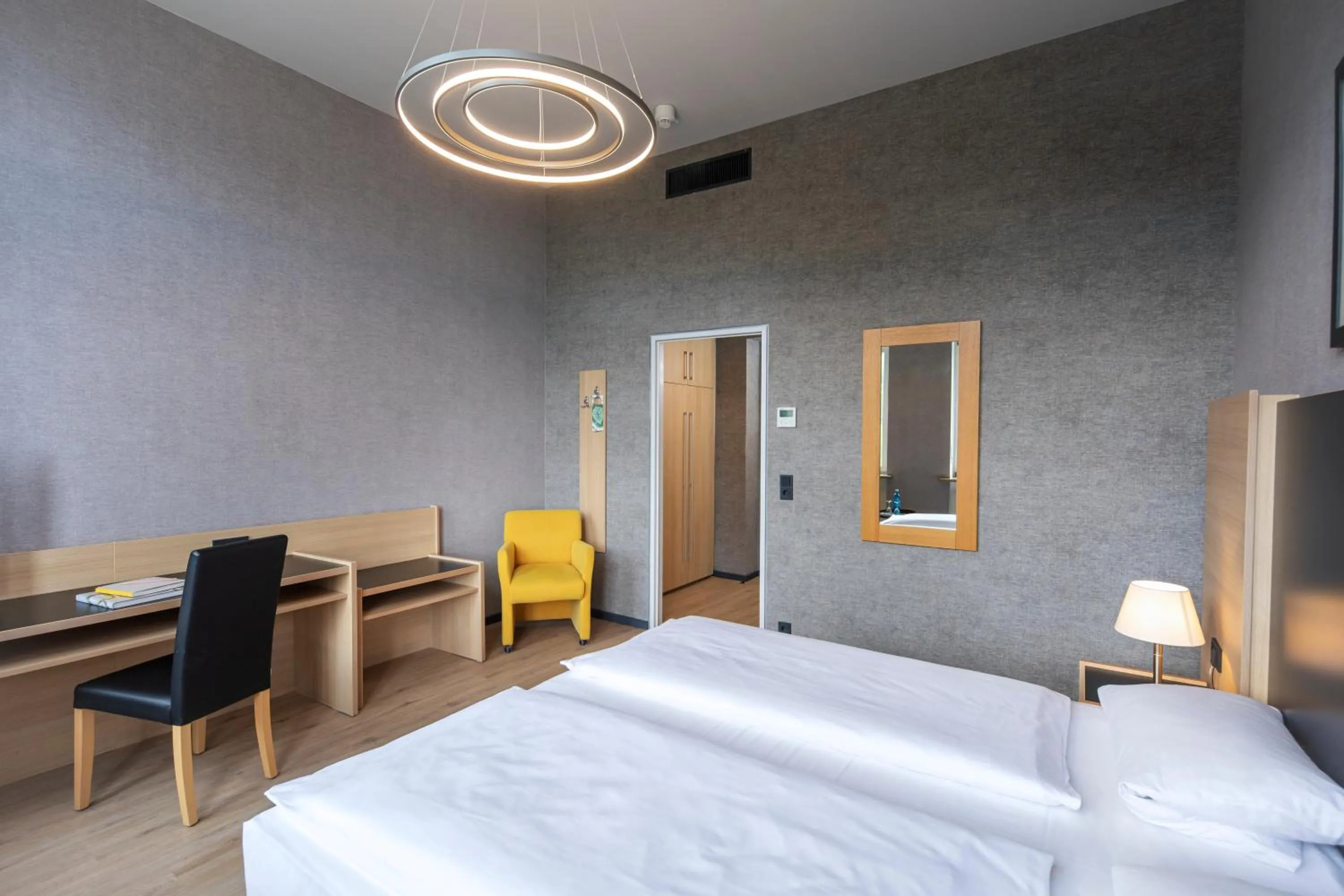 Photo of the whole room, Bed in Hotel Franziskushöhe Lohr