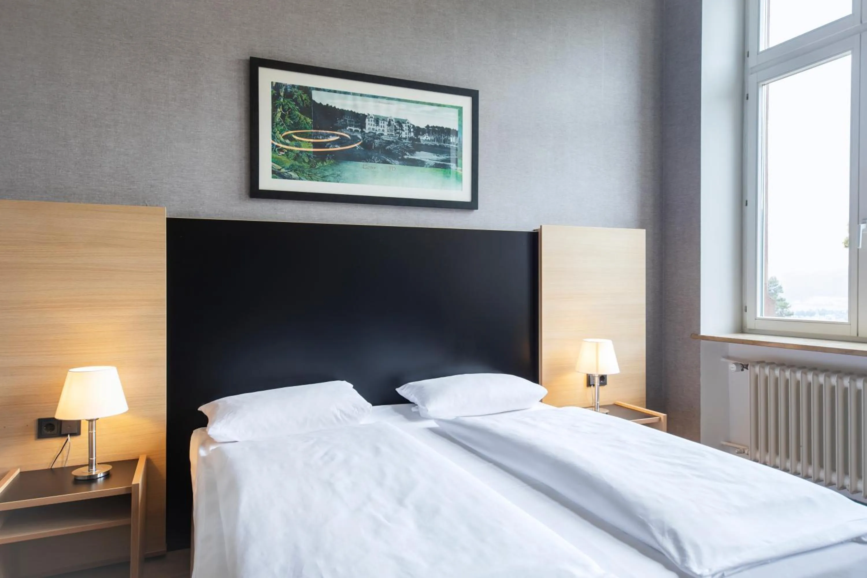 Photo of the whole room, Bed in Hotel Franziskushöhe Lohr