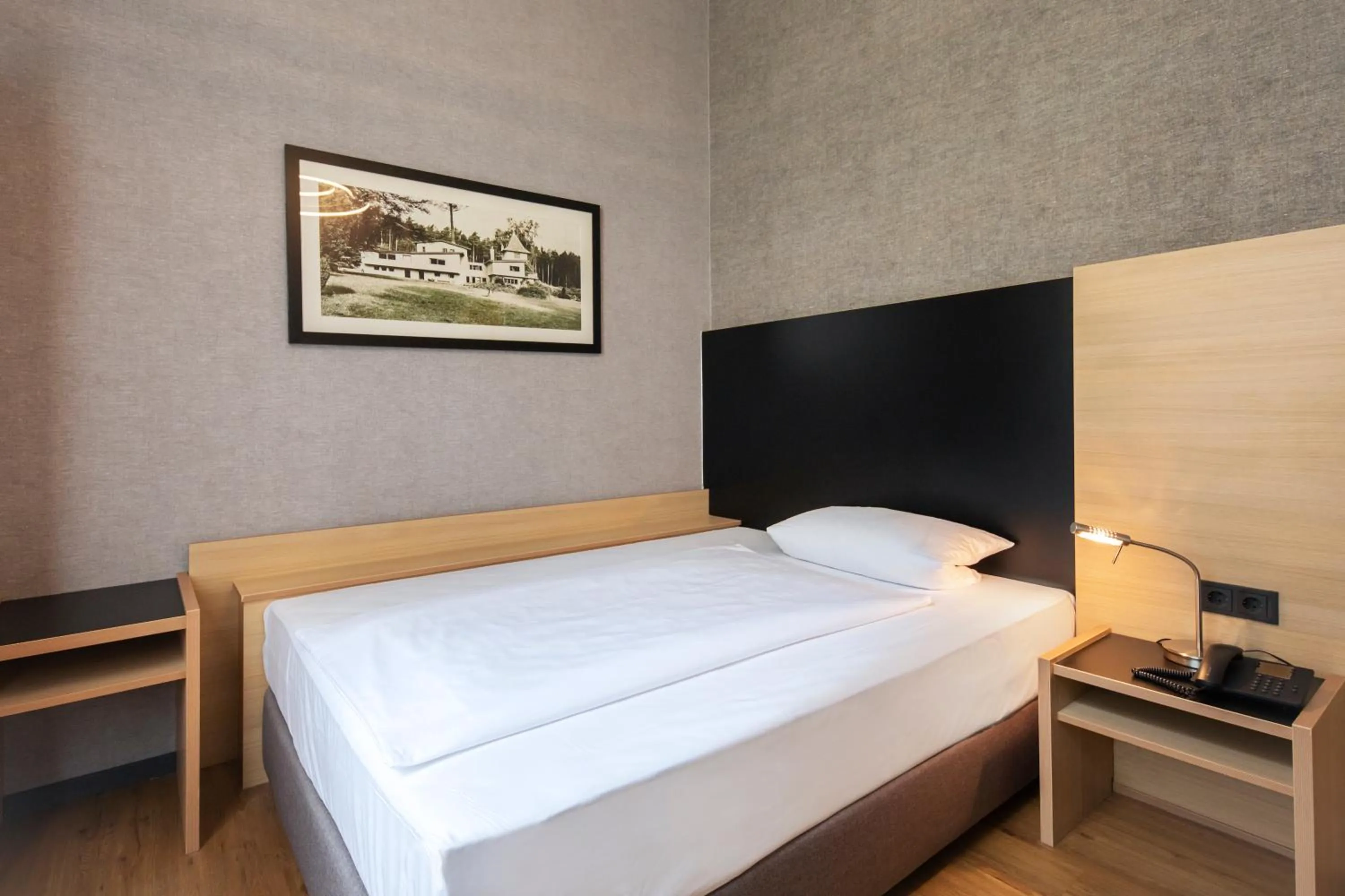 Photo of the whole room, Bed in Hotel Franziskushöhe Lohr