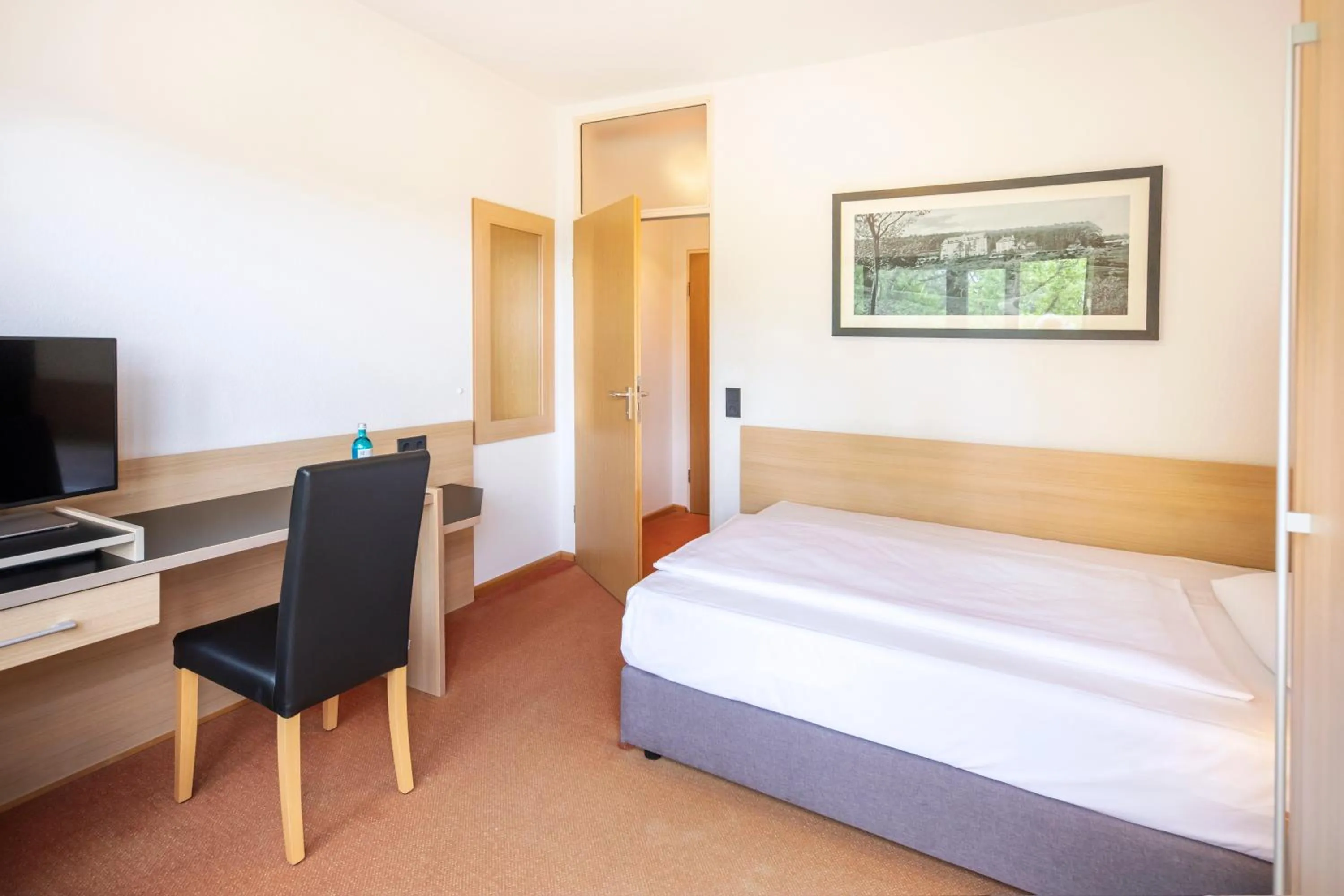 Photo of the whole room, Bed in Hotel Franziskushöhe Lohr