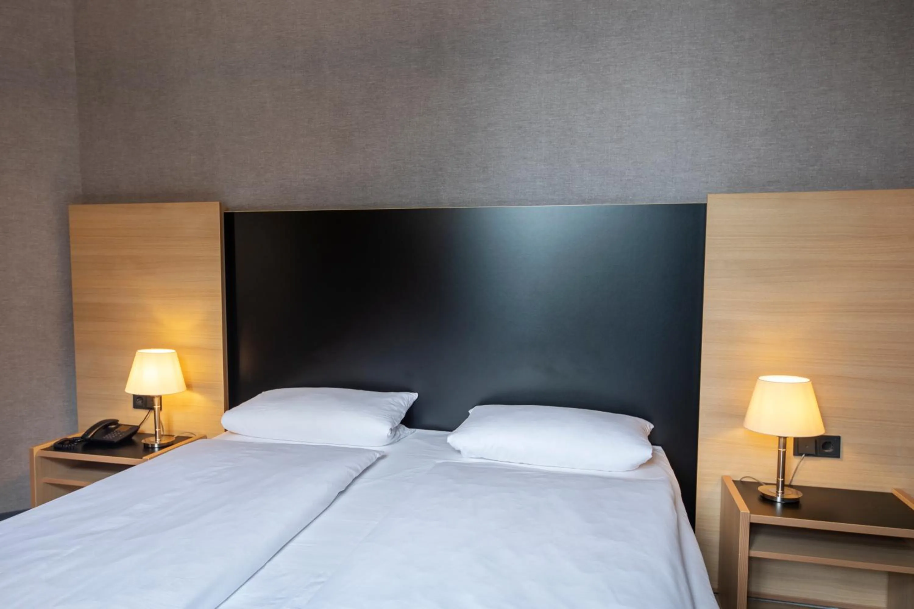 Photo of the whole room, Bed in Hotel Franziskushöhe Lohr