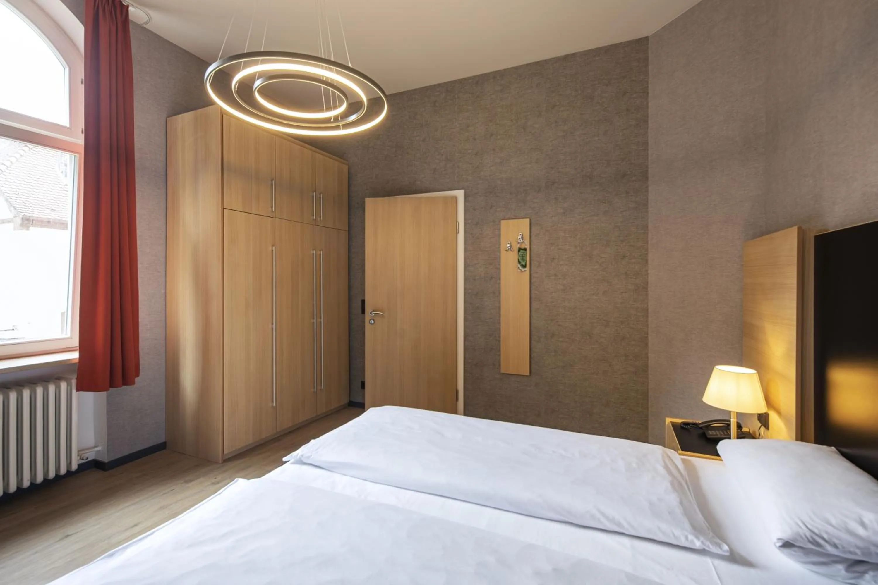 Photo of the whole room, Bed in Hotel Franziskushöhe Lohr