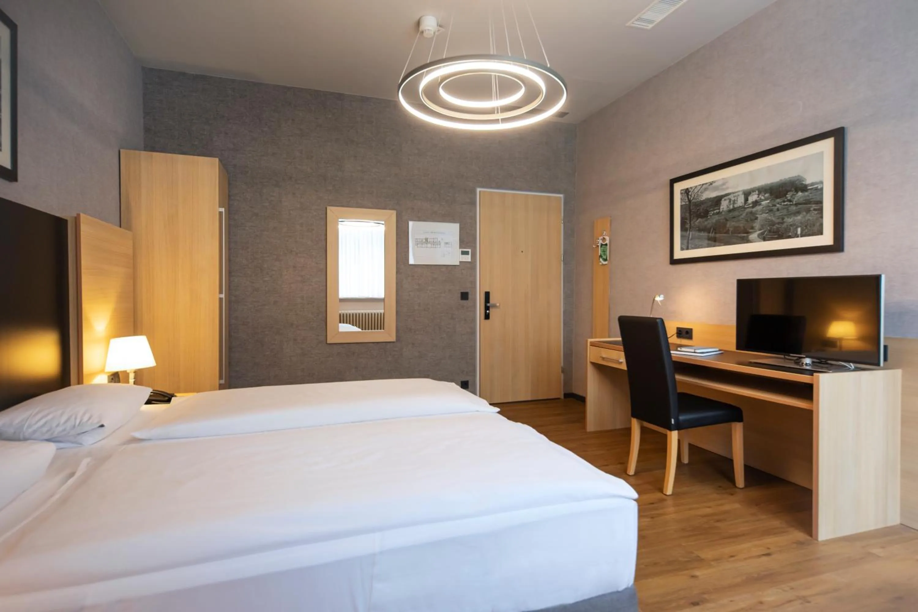 Photo of the whole room, Bed in Hotel Franziskushöhe Lohr