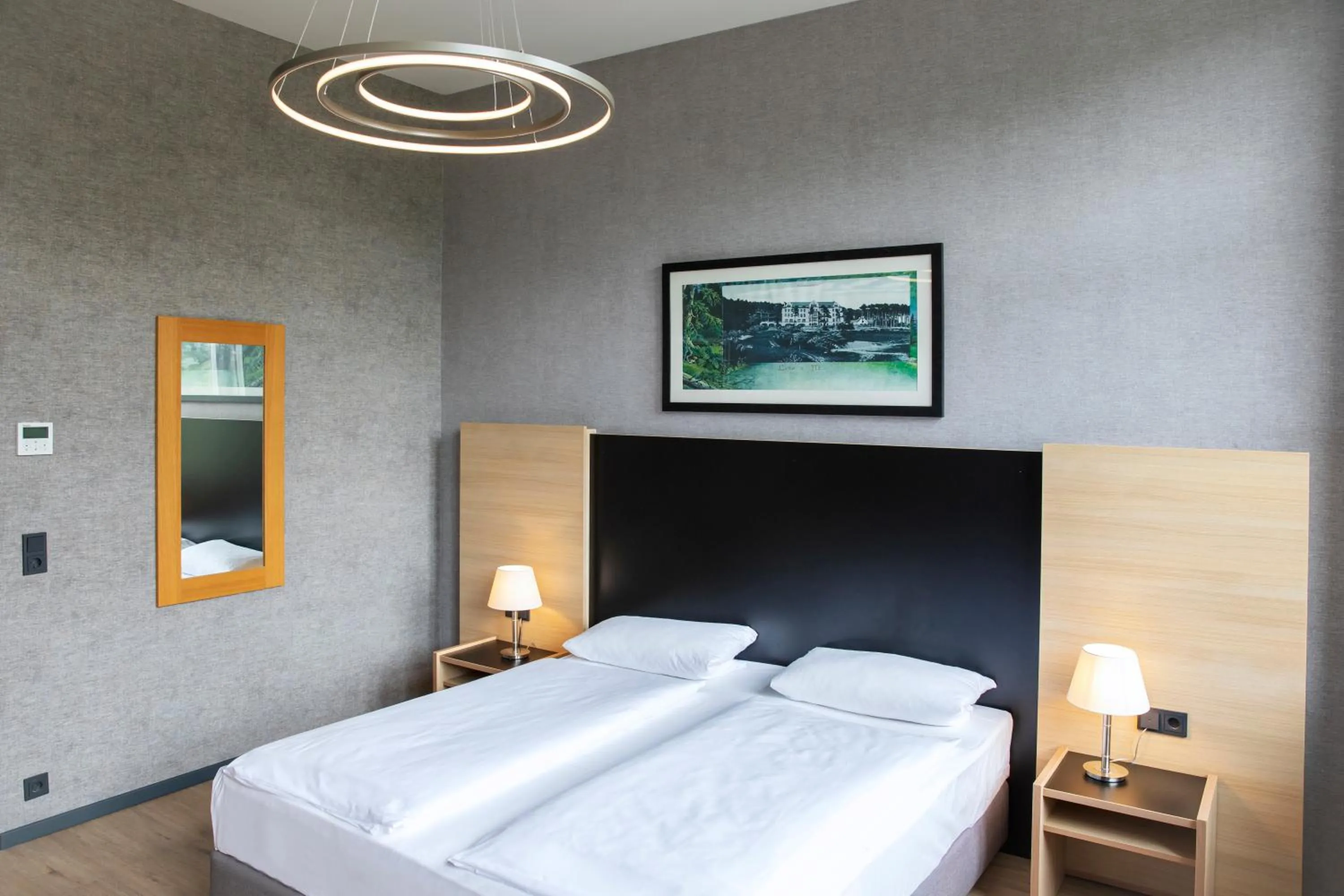 Photo of the whole room, Bed in Hotel Franziskushöhe Lohr