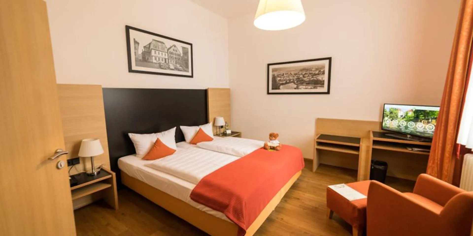 Photo of the whole room, Bed in Hotel Franziskushöhe Lohr