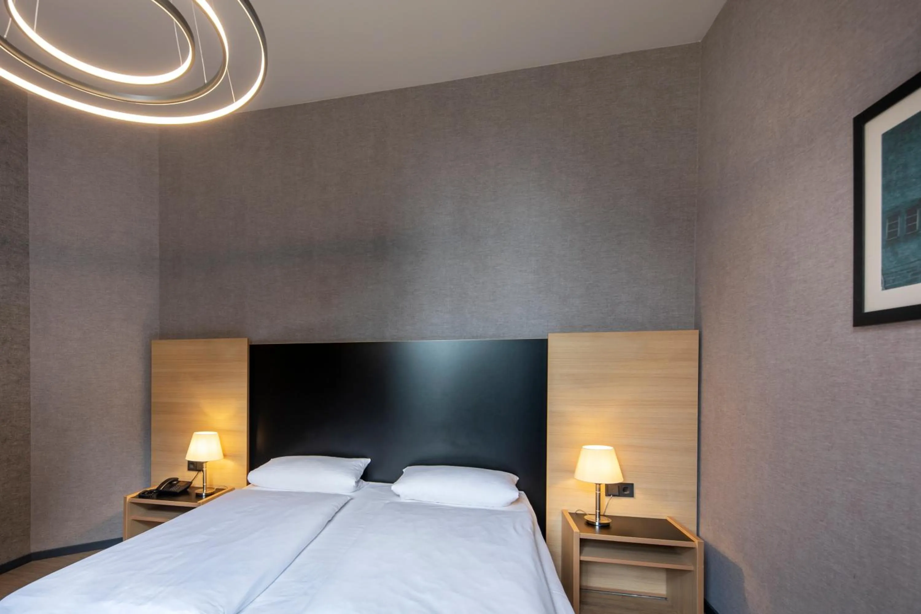 Photo of the whole room, Bed in Hotel Franziskushöhe Lohr