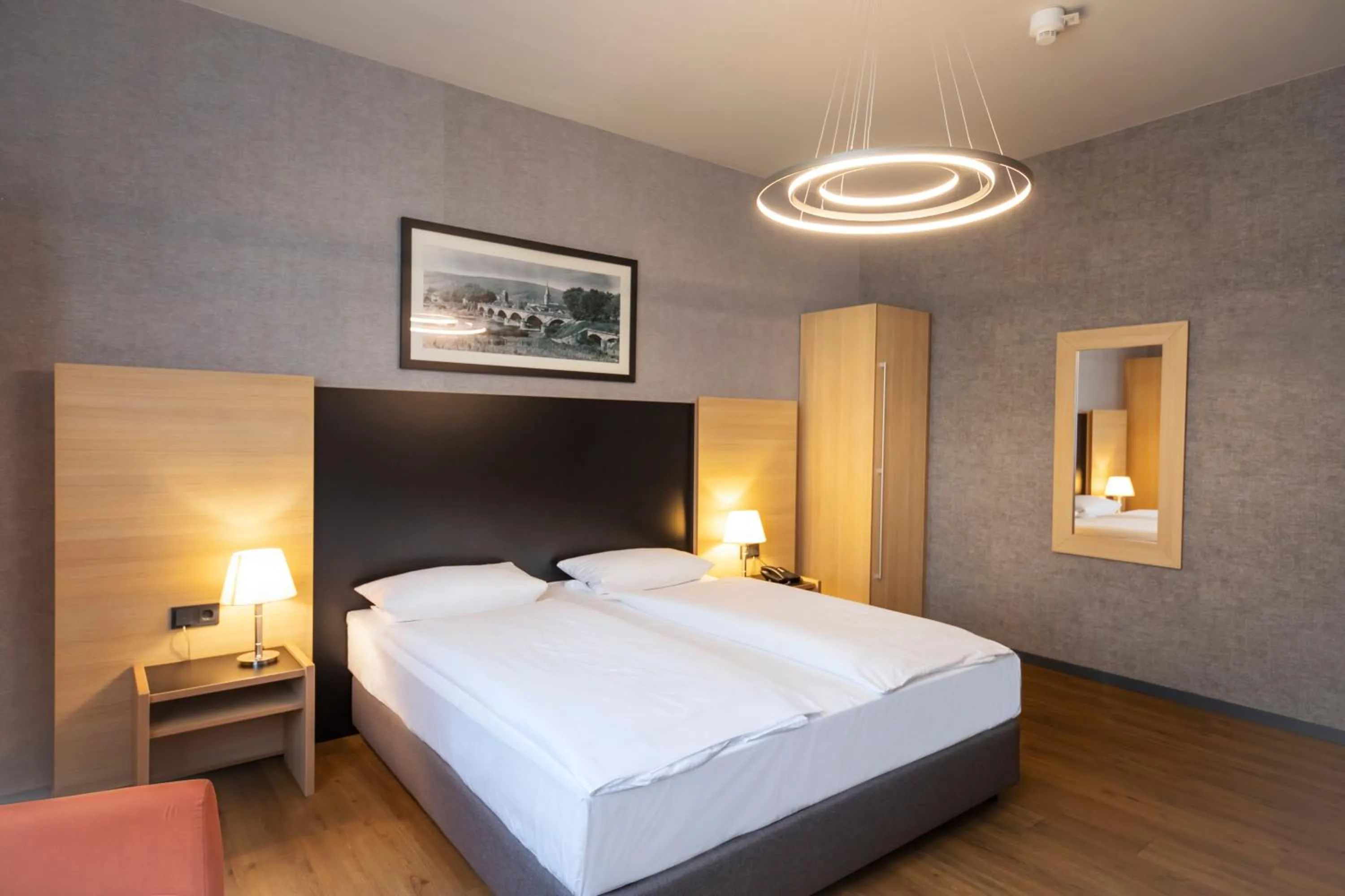 Photo of the whole room, Bed in Hotel Franziskushöhe Lohr