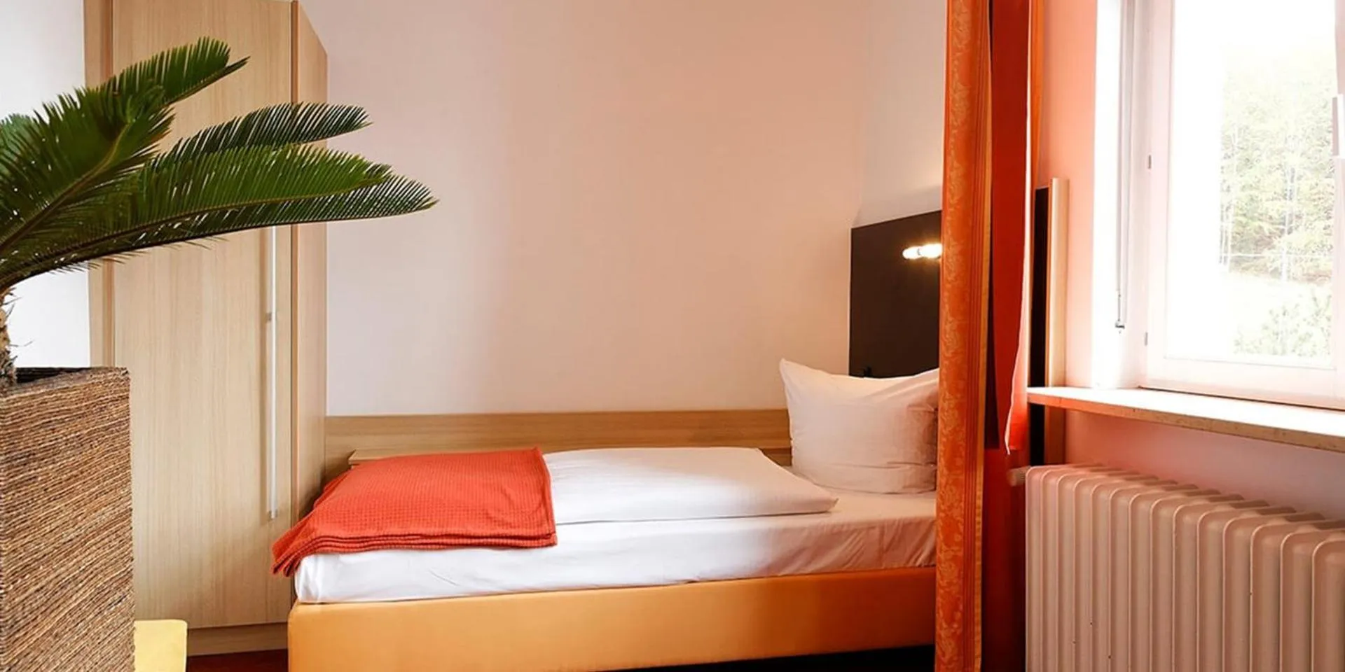 Photo of the whole room, Bed in Hotel Franziskushöhe Lohr