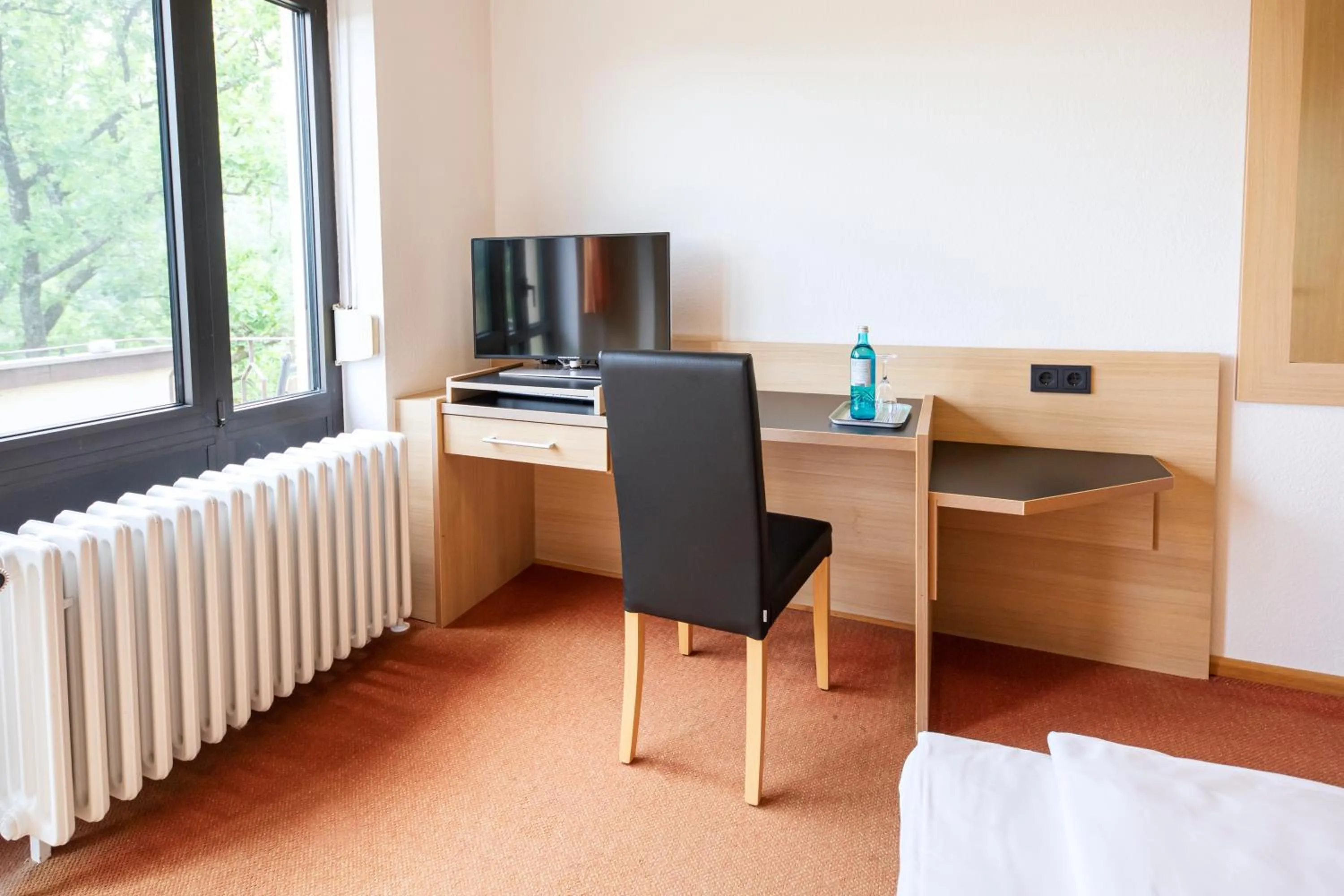 Photo of the whole room, Bed in Hotel Franziskushöhe Lohr