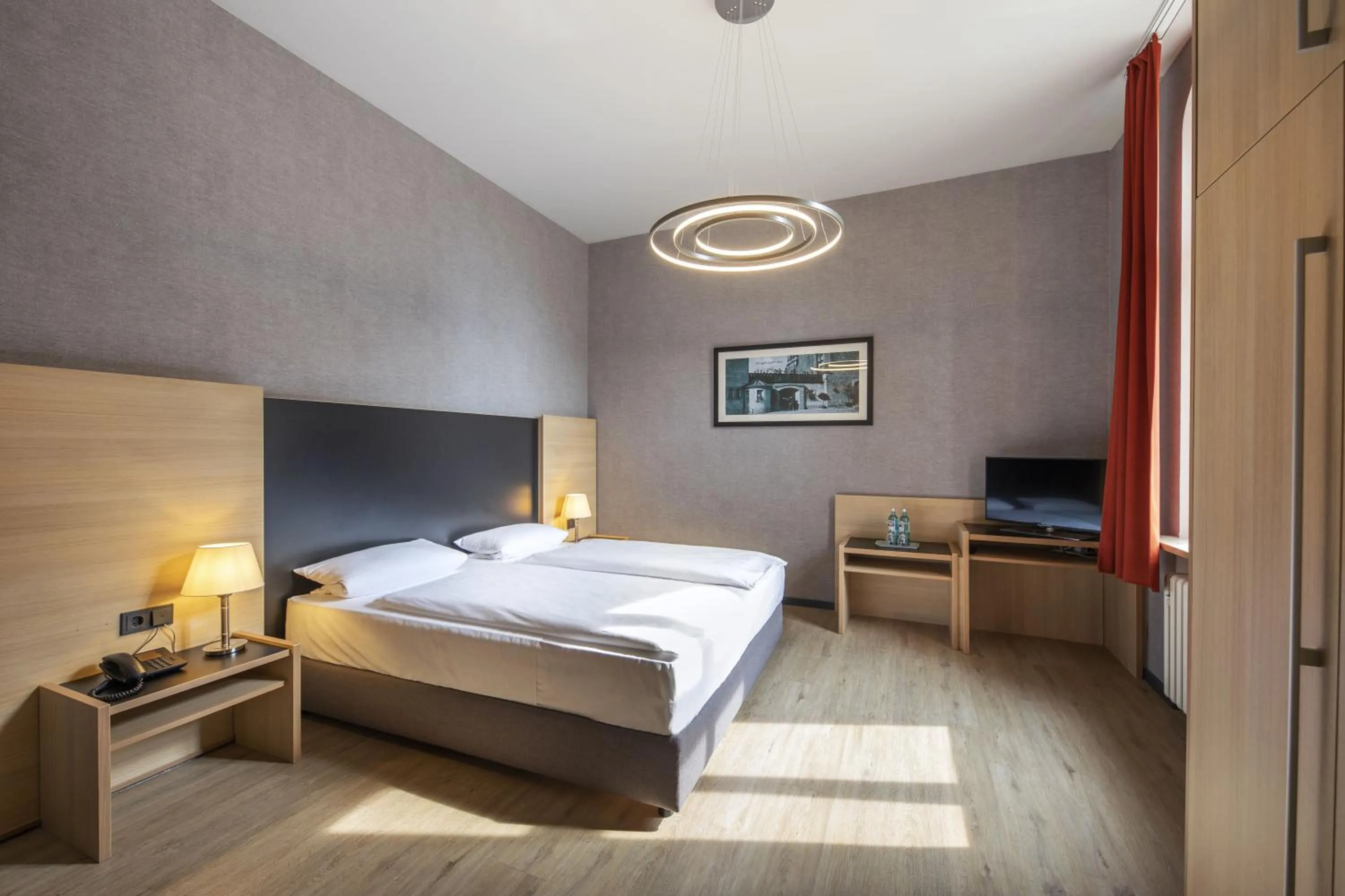 Photo of the whole room, Bed in Hotel Franziskushöhe Lohr