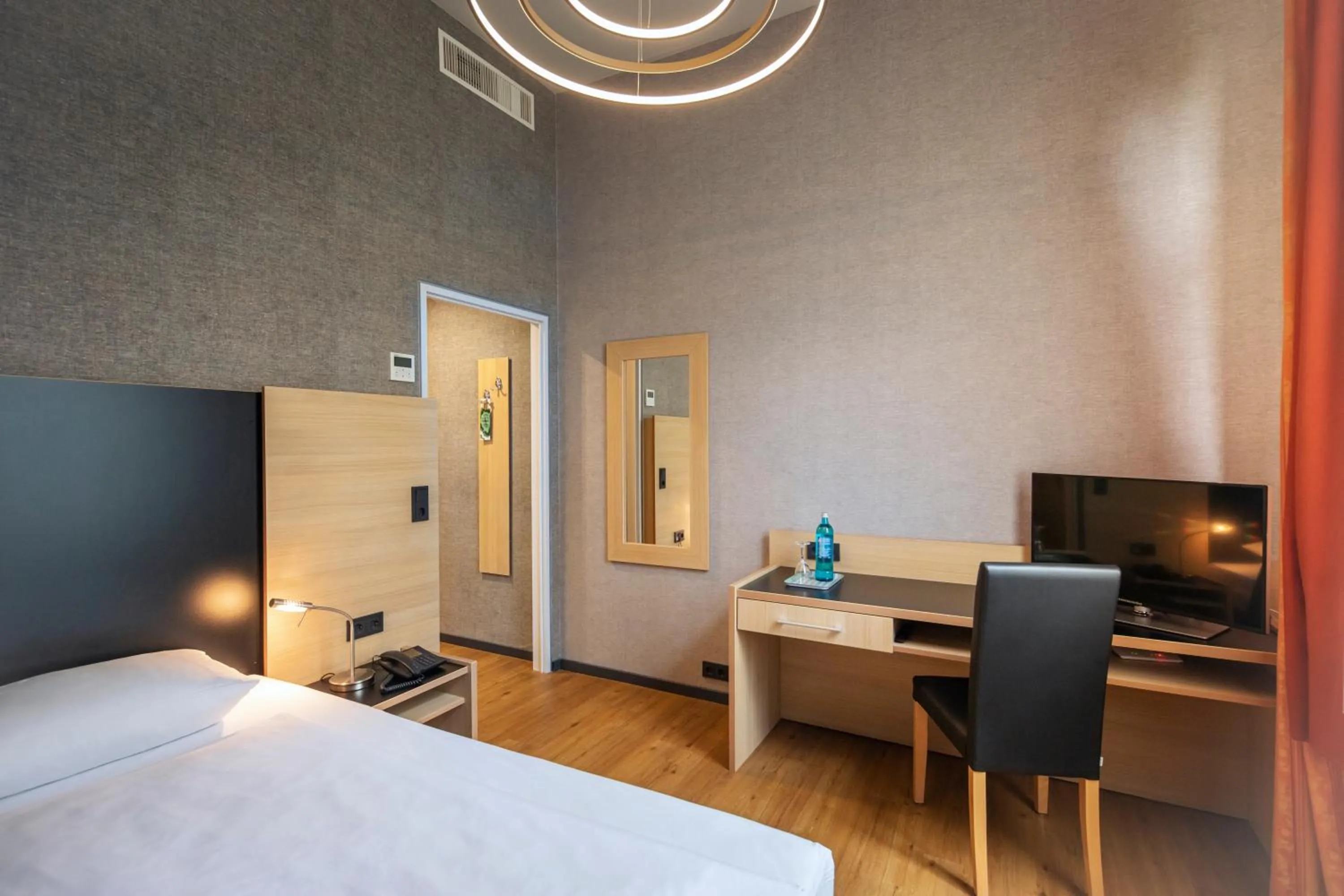 Photo of the whole room, Bed in Hotel Franziskushöhe Lohr