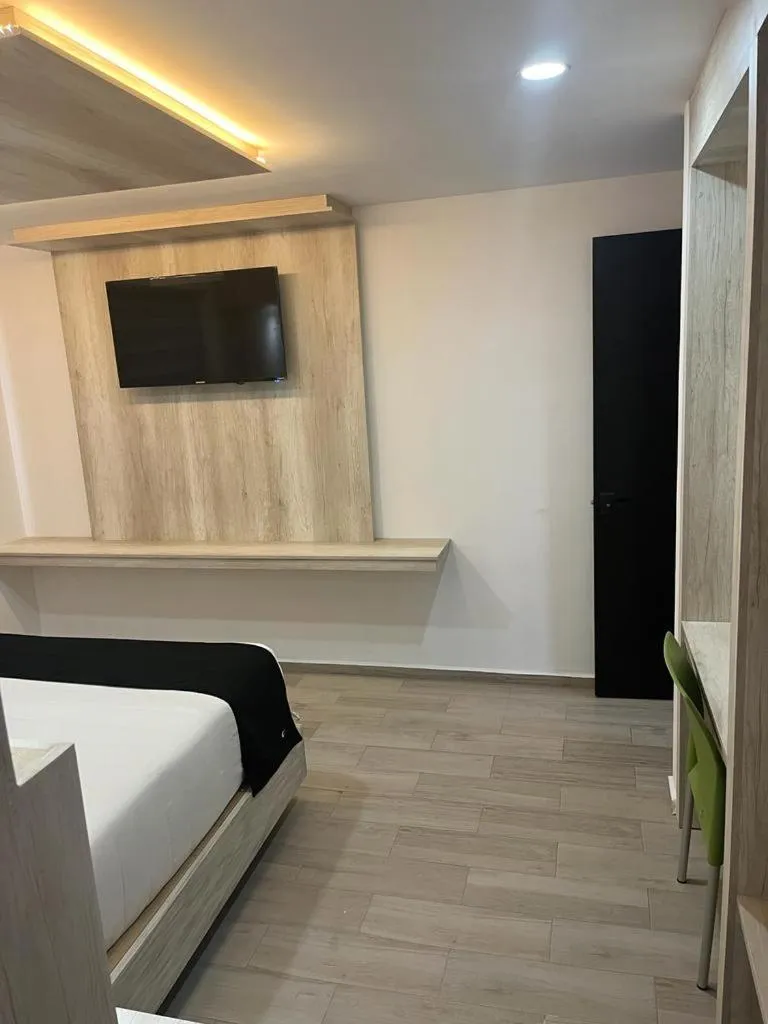 Bed in Hotel La Estancia Zacatlan