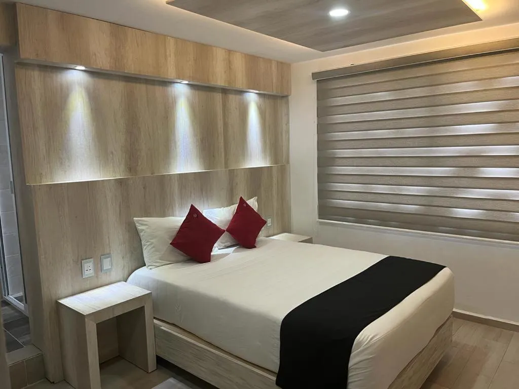 Bed in Hotel La Estancia Zacatlan