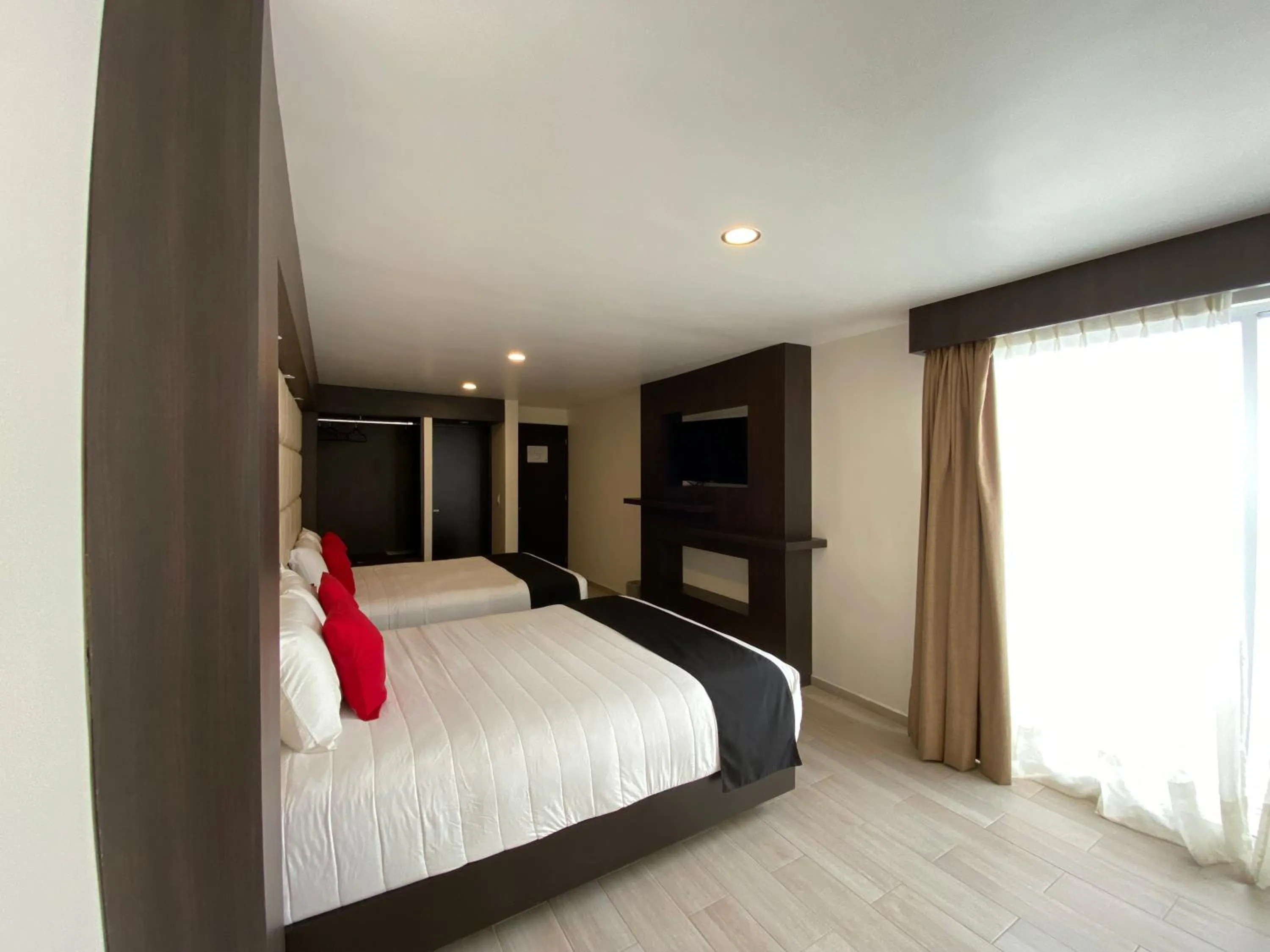 Bed in Hotel La Estancia Zacatlan