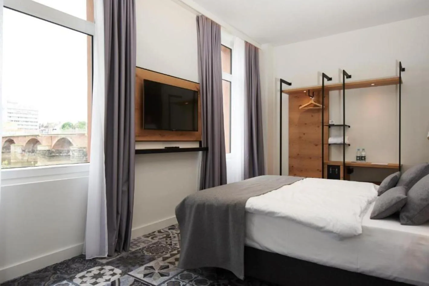 Photo of the whole room, Bed in Coffee Fellows Hotel Trier