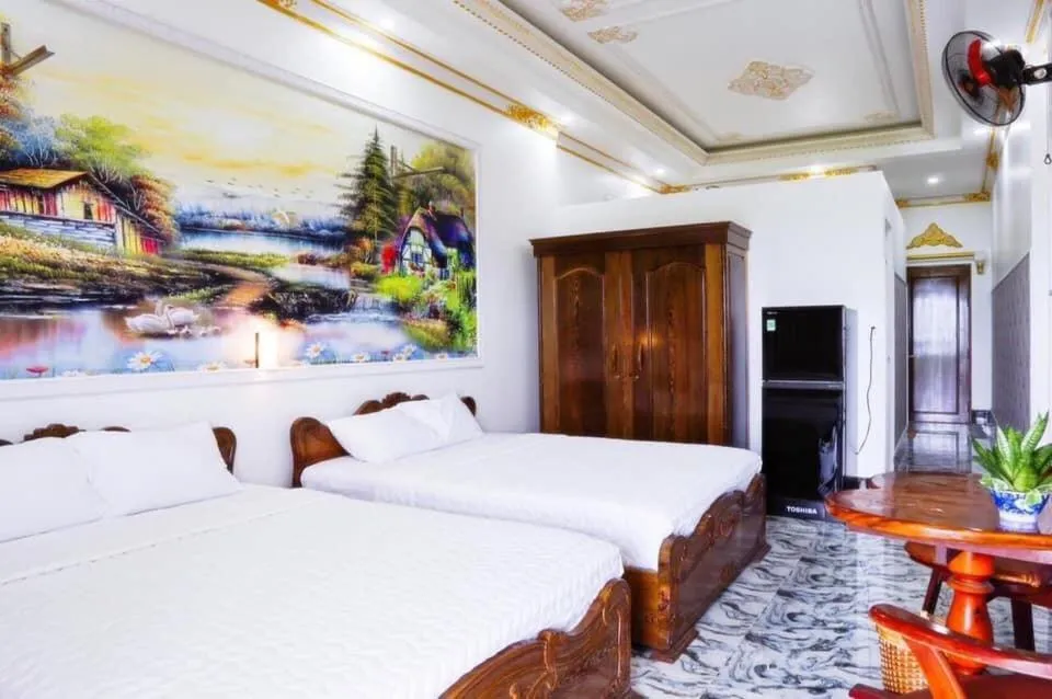 Bed in Little Saigon Hotel