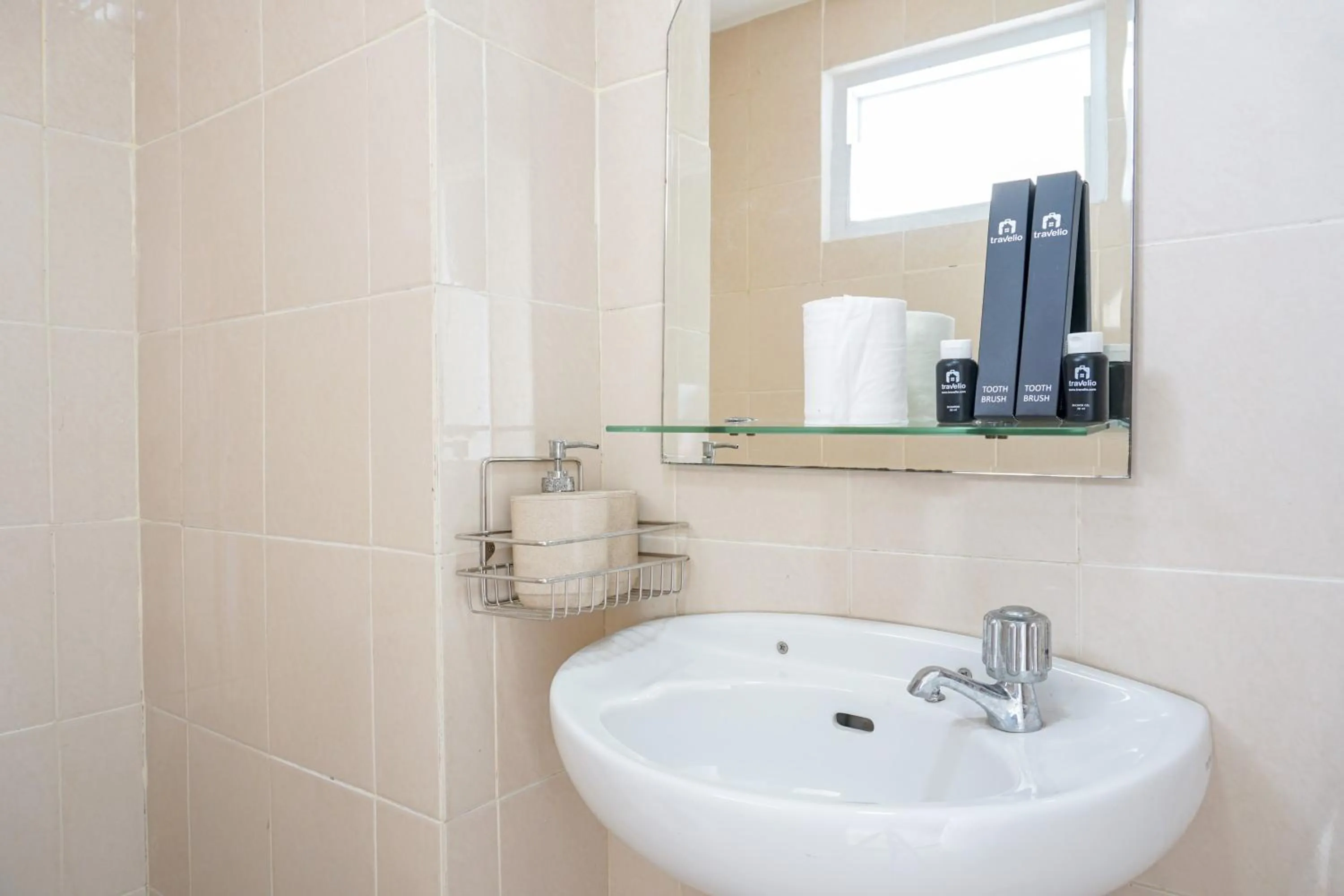 Comfortable 3BR Apartment at Green Palm Residences By Travelio