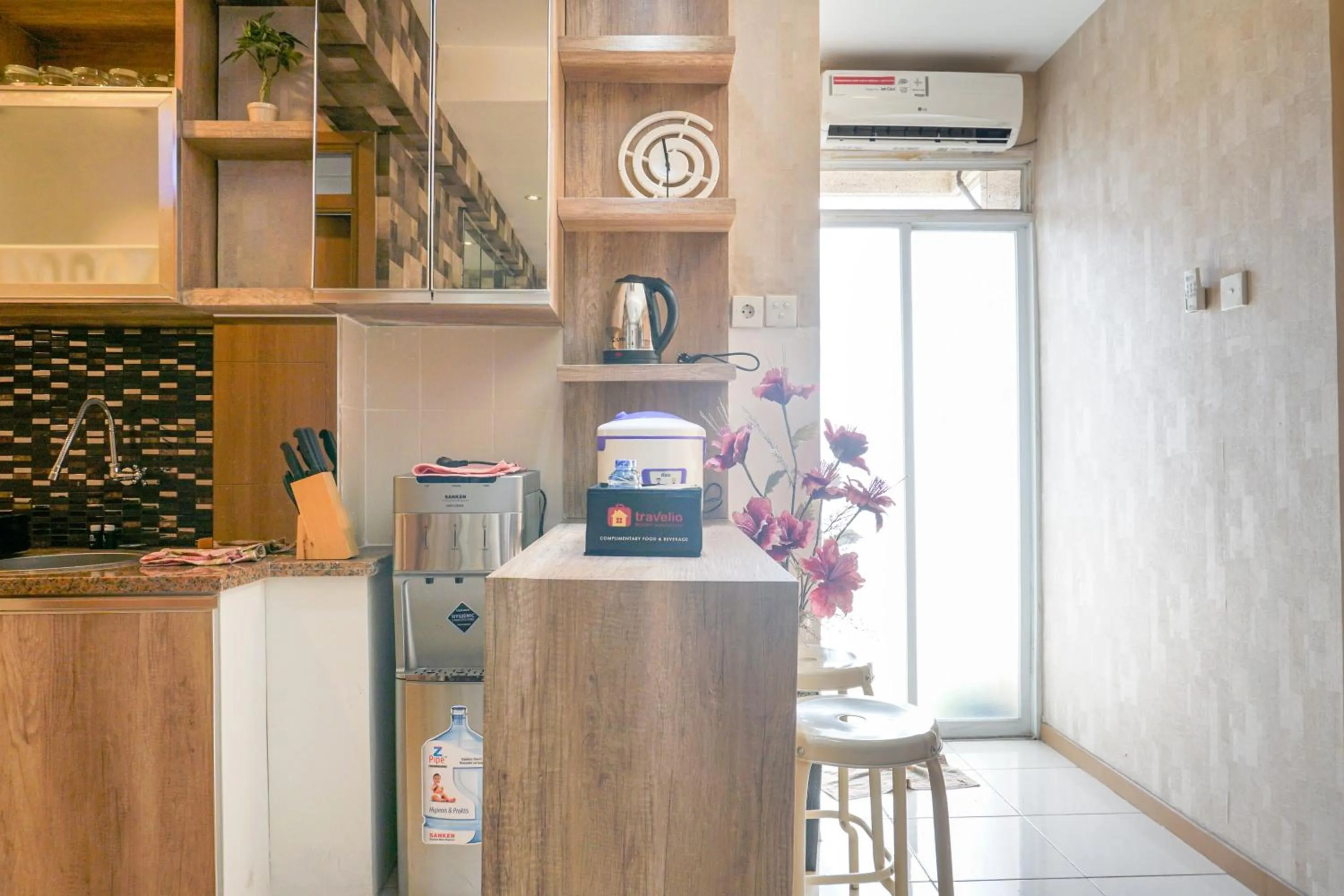 Dining area in Comfortable 3BR Apartment at Green Palm Residences By Travelio
