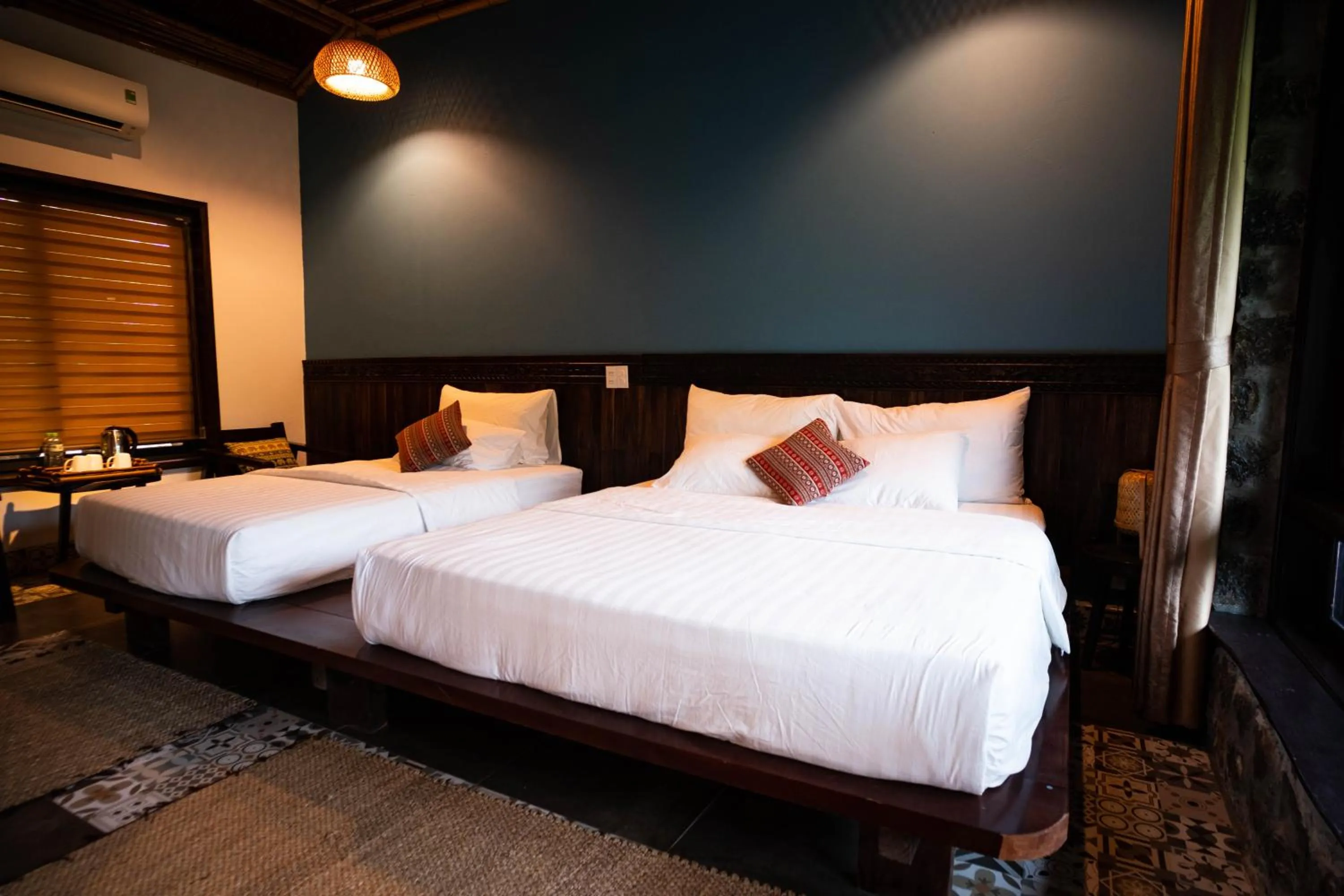 Bed in Trang An Ecolodge