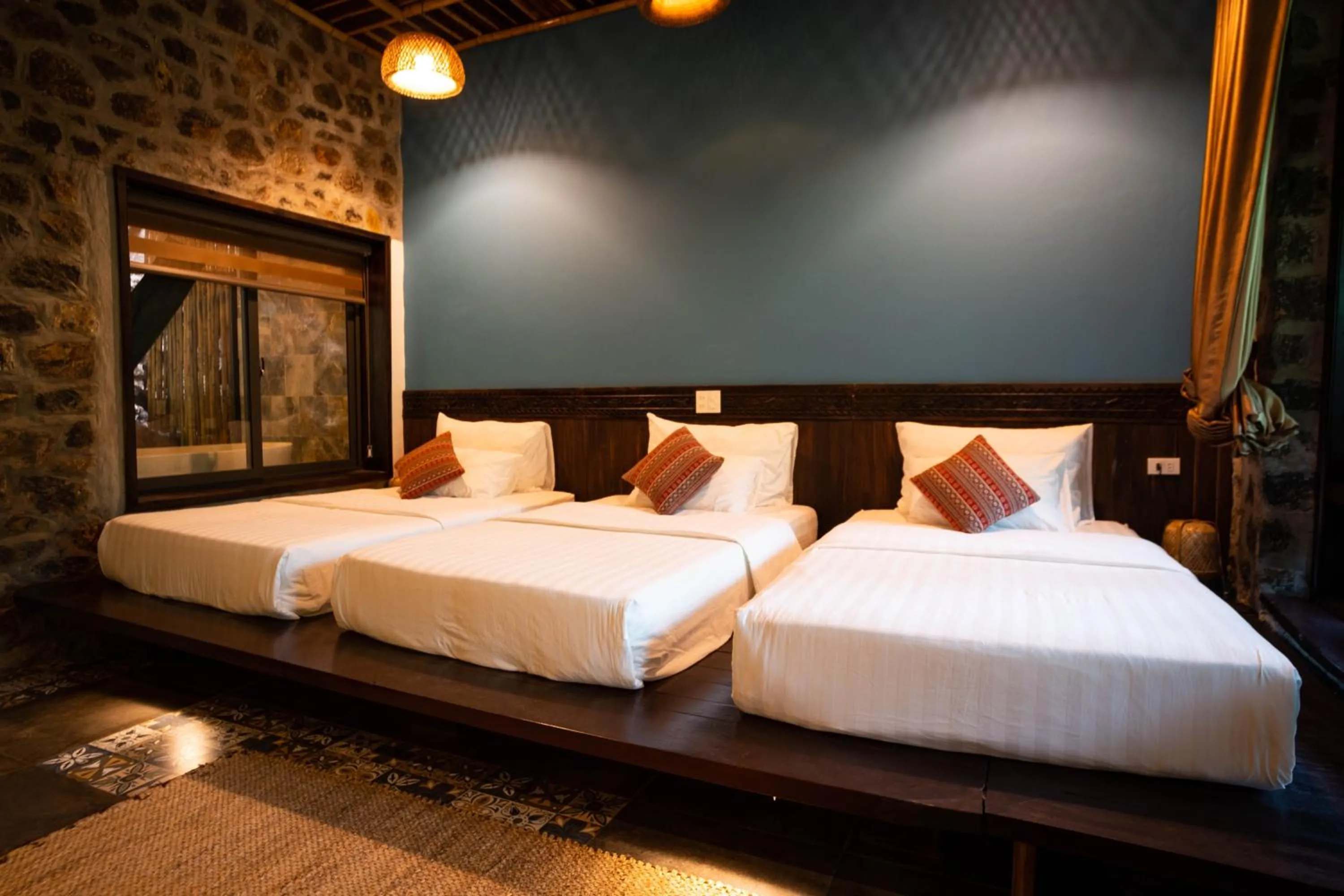 Bed in Trang An Ecolodge