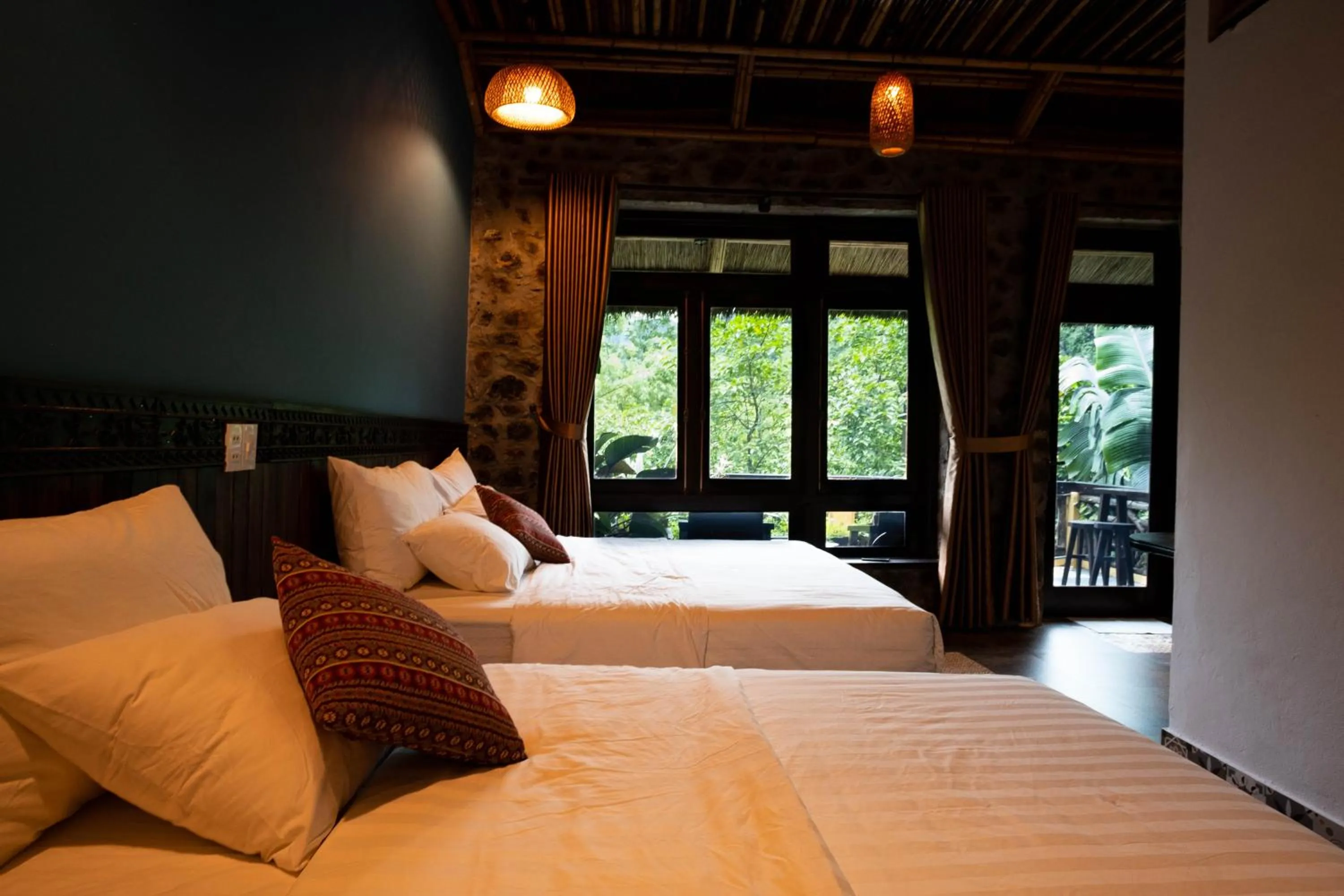 Bed in Trang An Ecolodge