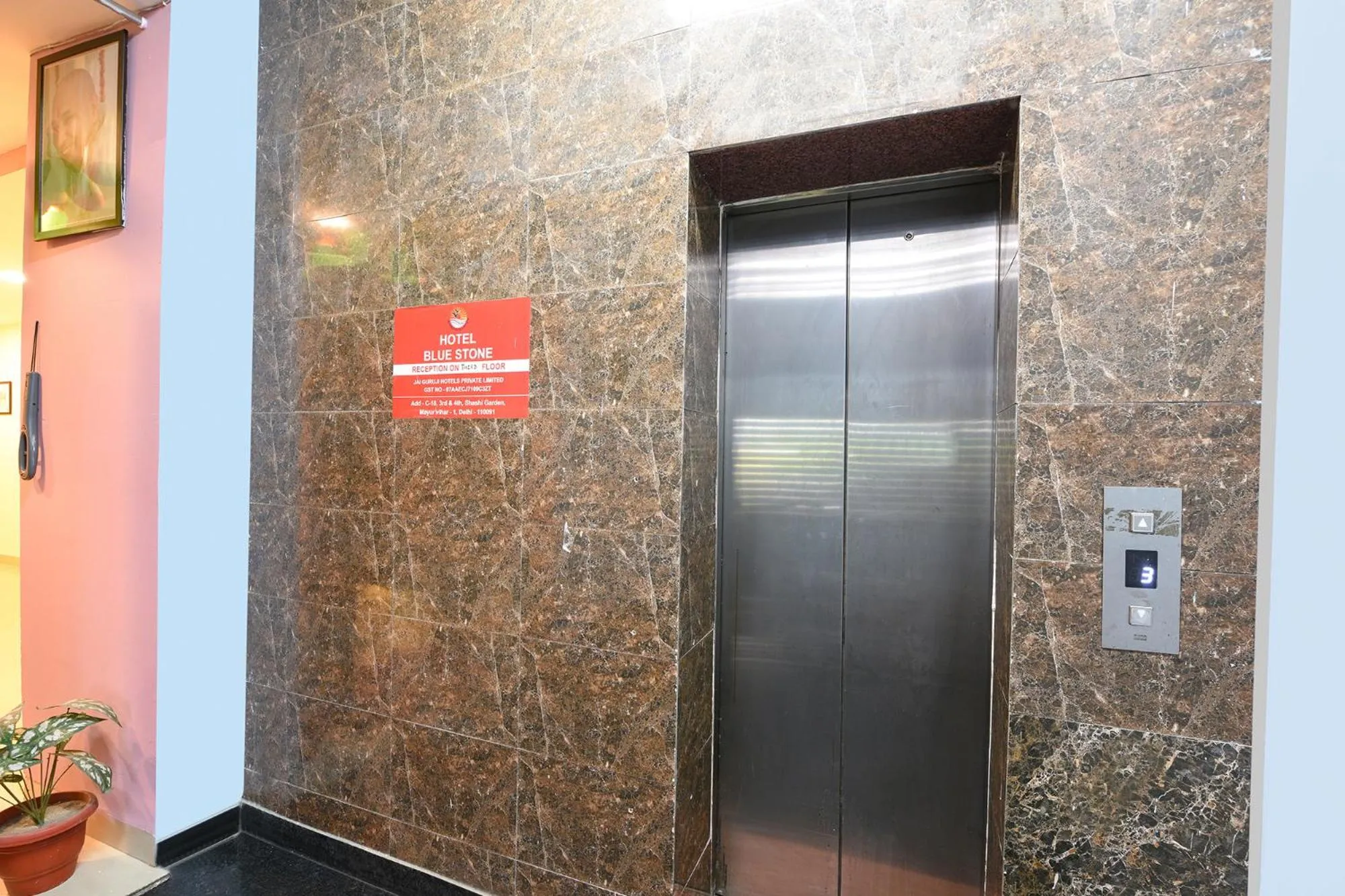 elevator in FabHotel Blue Stone
