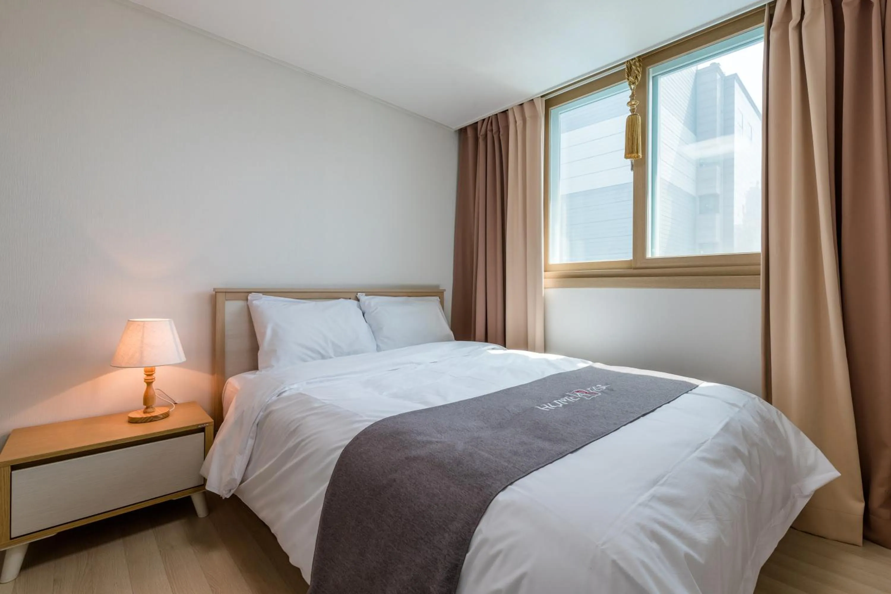 Bedroom, Bed in JS Residence Hotel Okpo