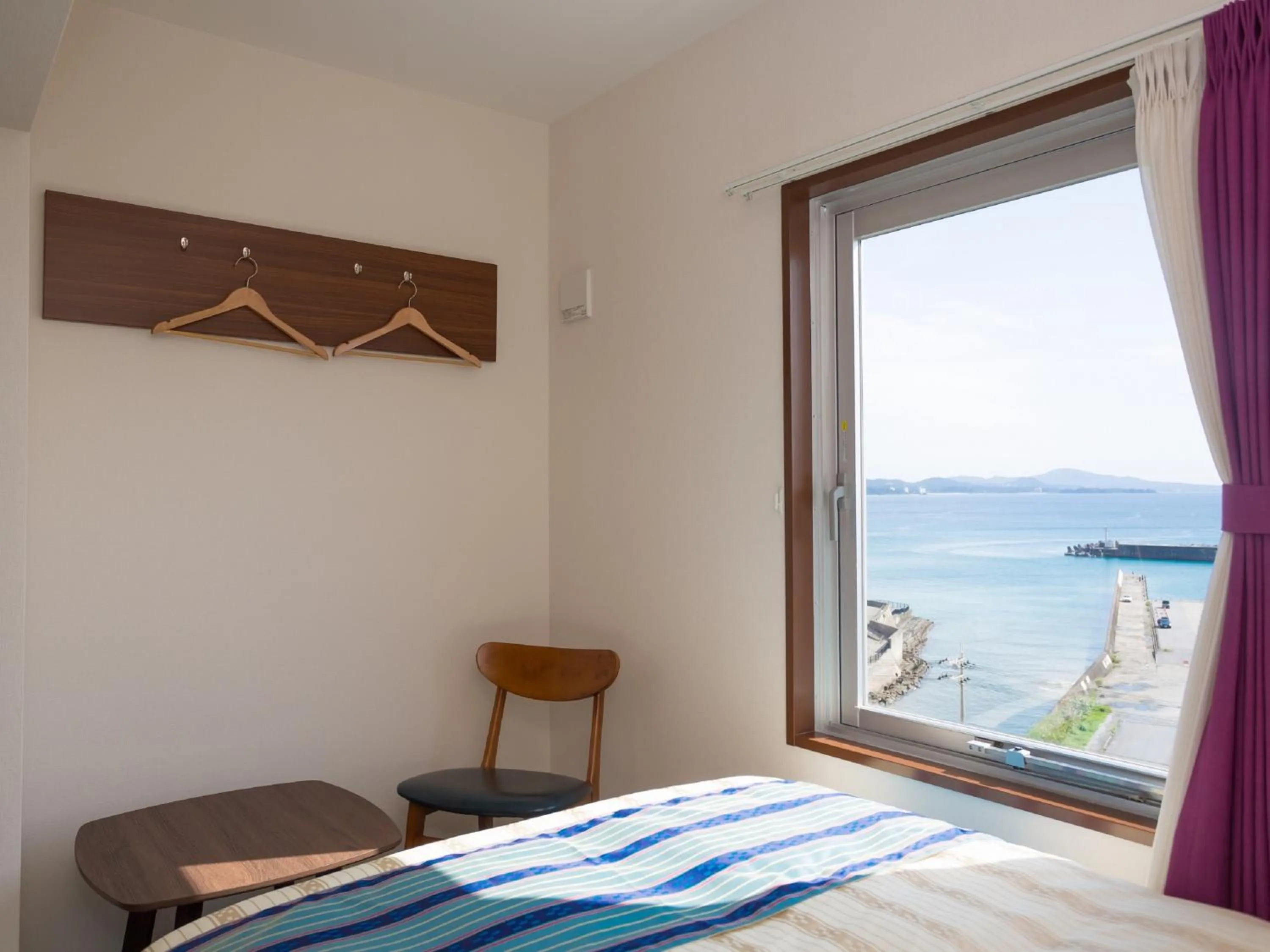 Bed in Hotel Peace Island Nago