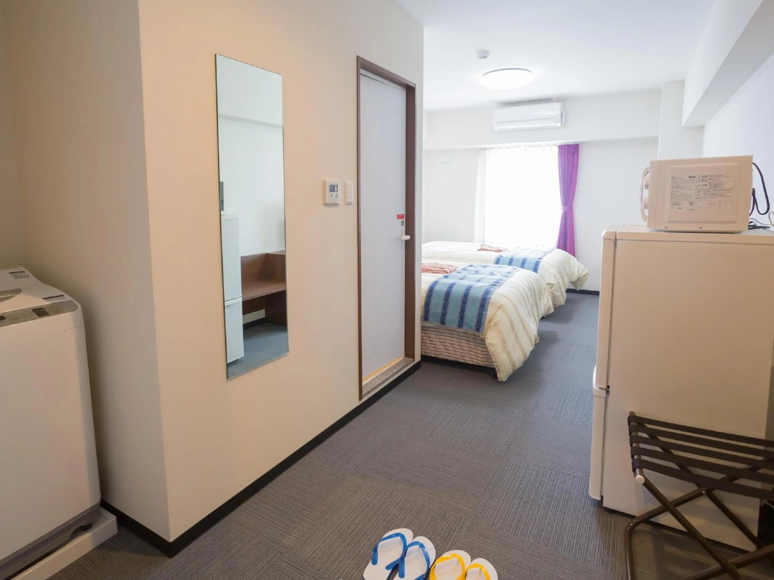 Photo of the whole room, Bed in Hotel Peace Island Nago