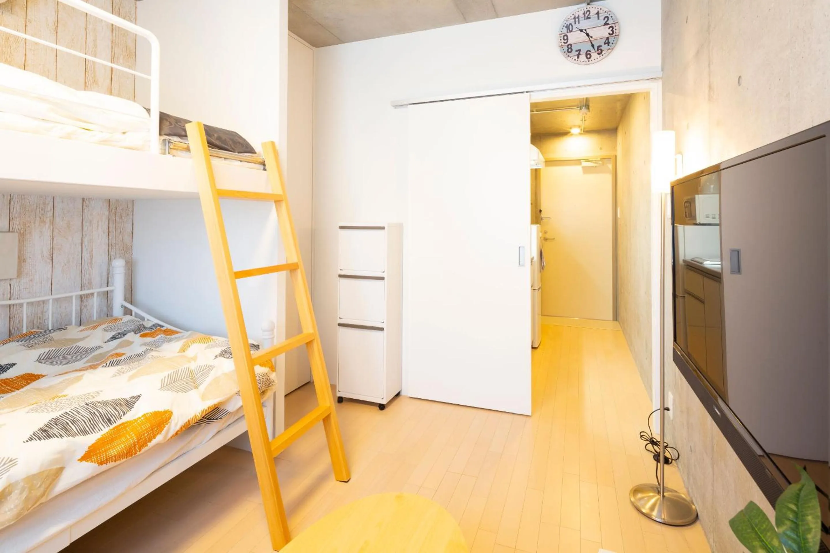 Bed in Laffitte Hirai Condominium Hotel