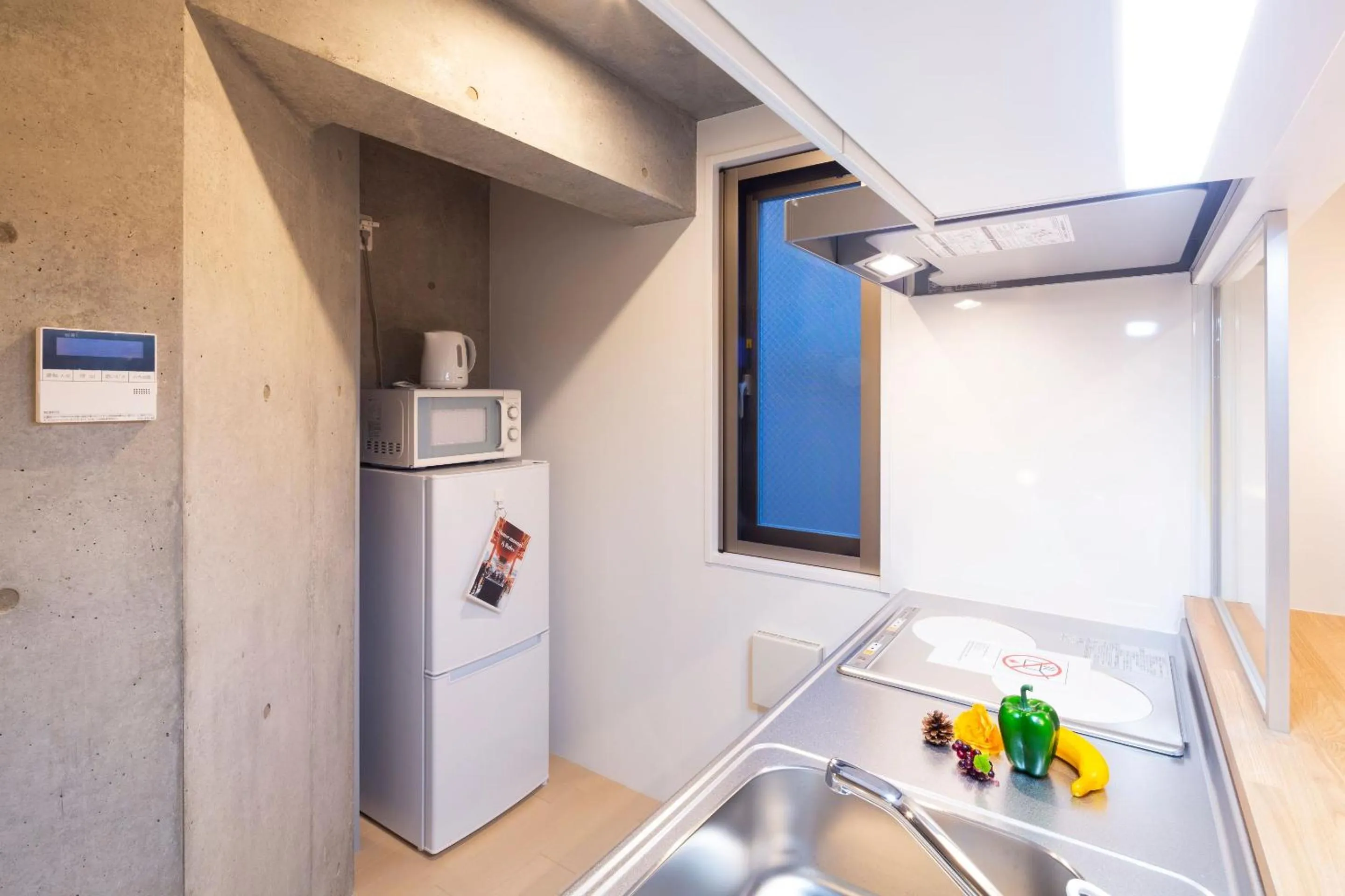 Kitchen or kitchenette in Laffitte Hirai Condominium Hotel