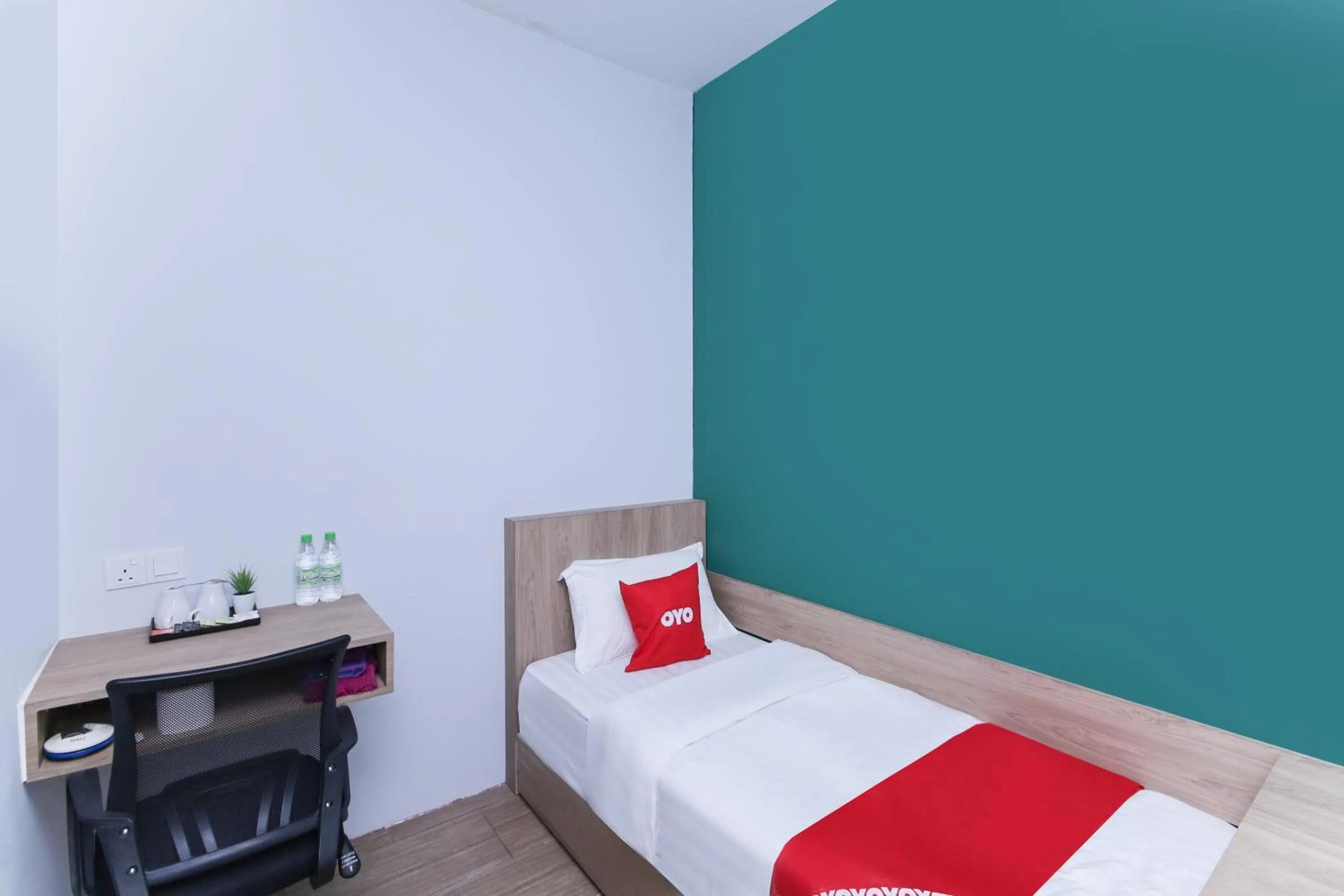 Bedroom in OYO 90399 Green Home Hotel syariah