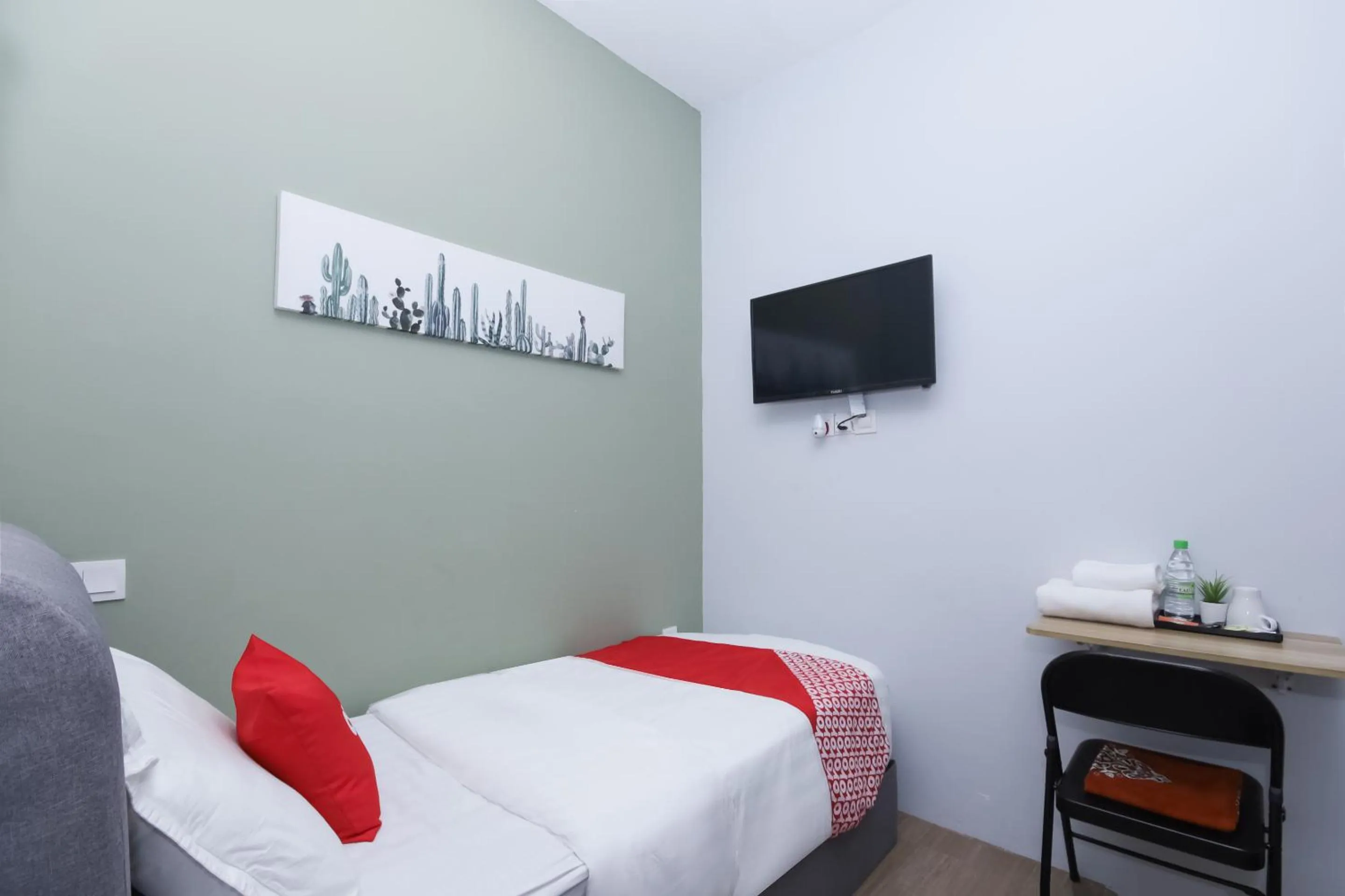 Bedroom in OYO 90399 Green Home Hotel syariah