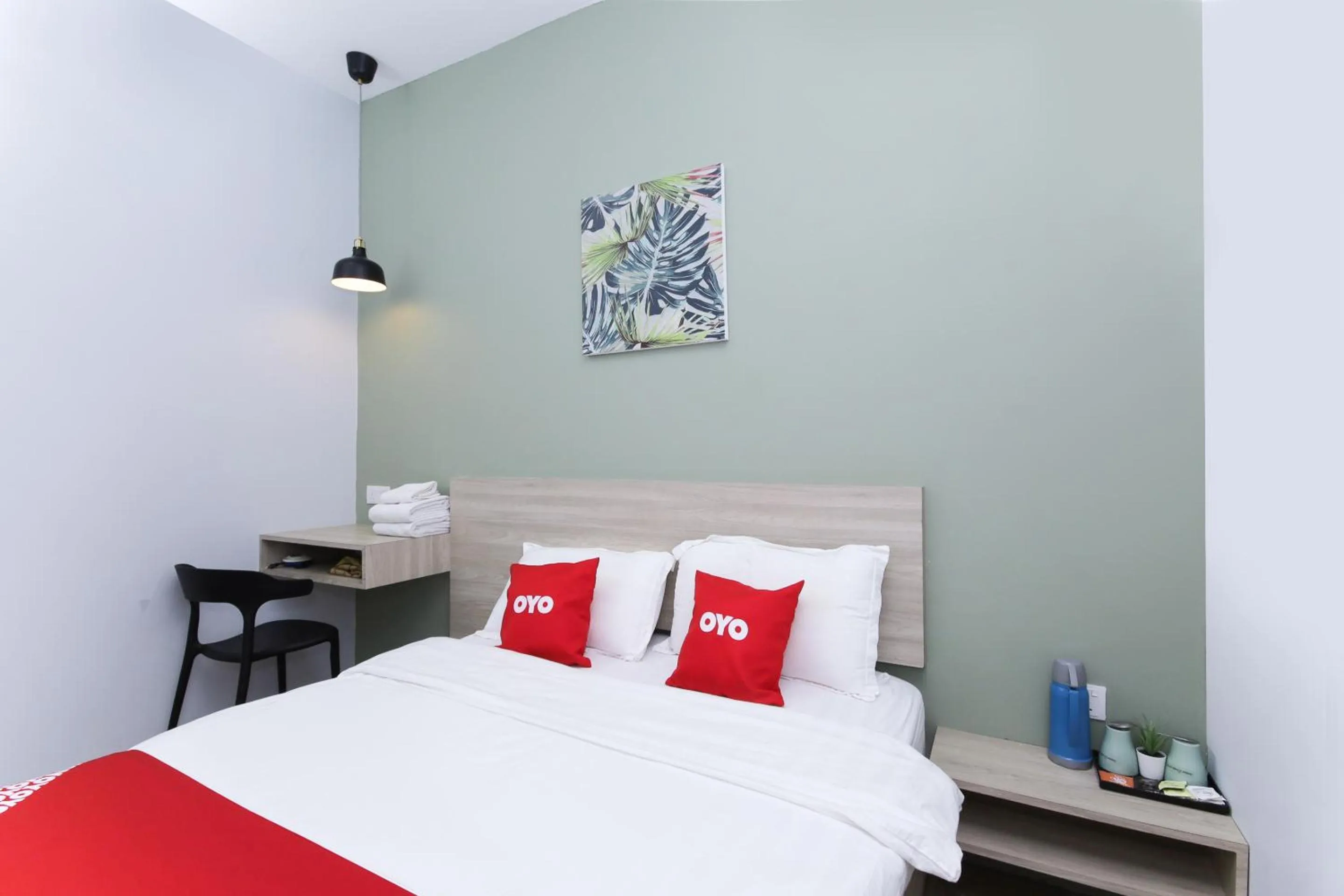 Bedroom in OYO 90399 Green Home Hotel syariah